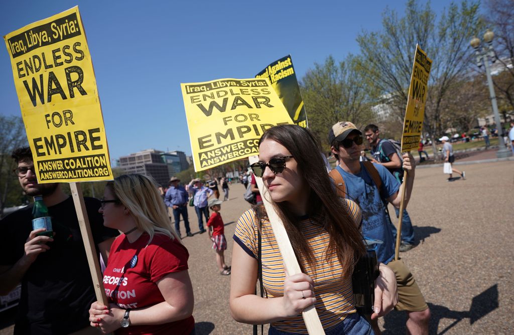 Demonstrators take part in a protest against the U.S. bombing of Syria in front of the White House on Apr. 14, 2018 in Washington, DC (Mandel Ngan—AFP/Getty Images)