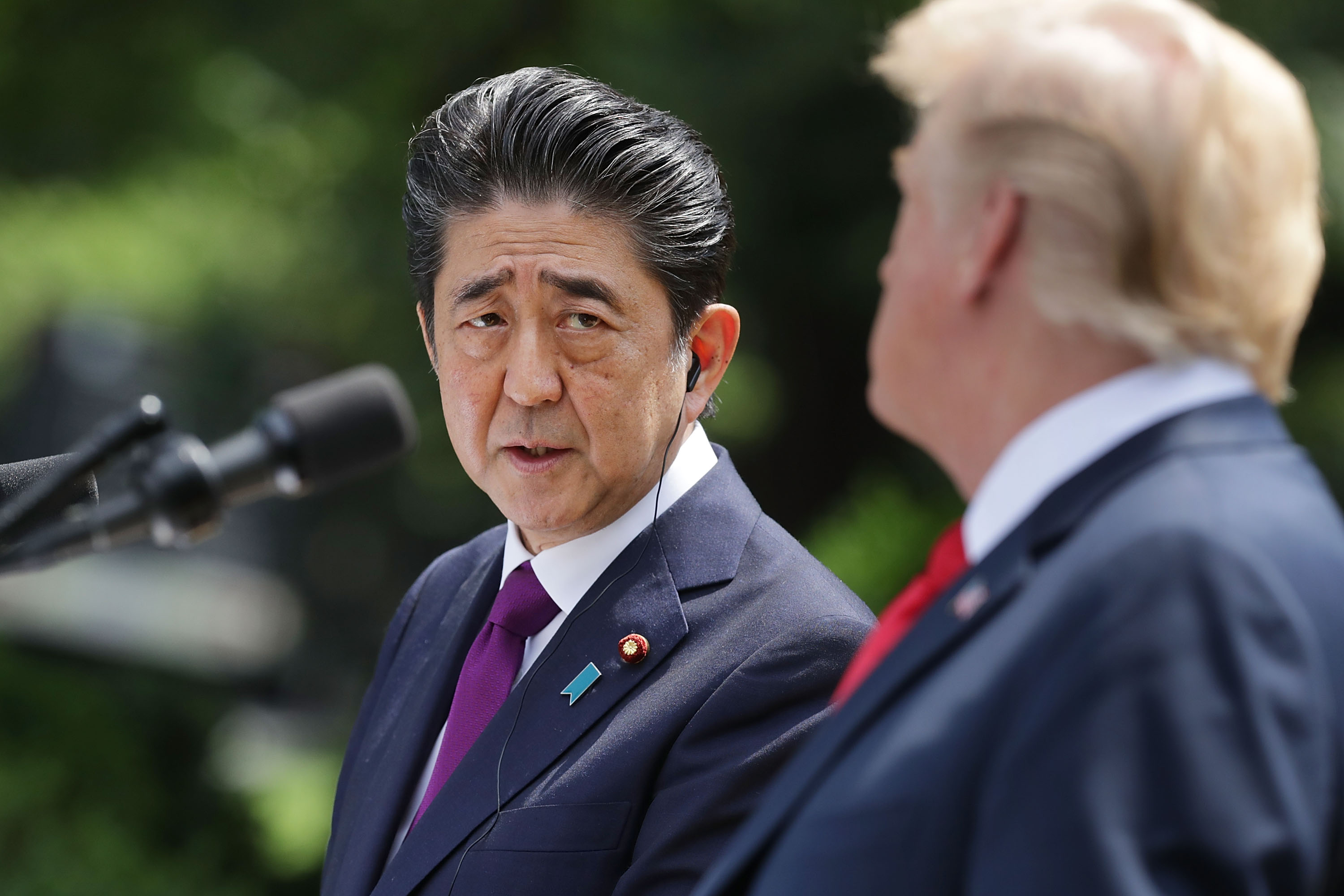 Japanese Prime Minister Shinzo Abe looks at President Donald Trump during a joint news conference at the White House on June 7, 2018 in Washington, DC. (Chip Somodevilla&mdash;Getty Images)