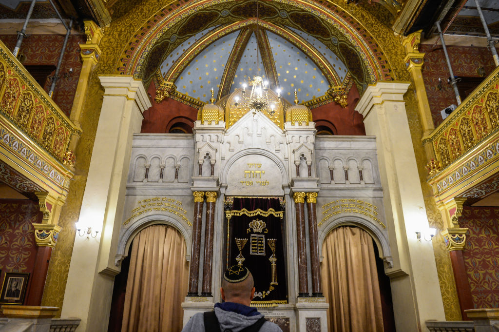 A Jewish man is seen inside the Temple Synagogue at Kazimierz, Krakow's historic Jewish quarter during the Night of the Temples. (SOPA Images—LightRocket via Getty Images)
