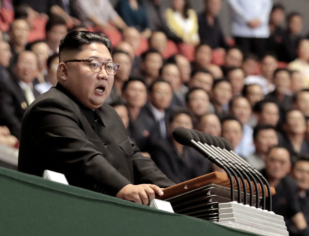 North Korean leader Kim Jong Un speaks after watch the gymnastic and artistic performance at the May Day Stadium on Sept. 19, 2018 in Pyongyang, North Korea. Kim is set to meet President Trump in Hanoi, Vietnam and started to make his train journey to there on Feb. 23, 2019. (Pool—Getty Images)
