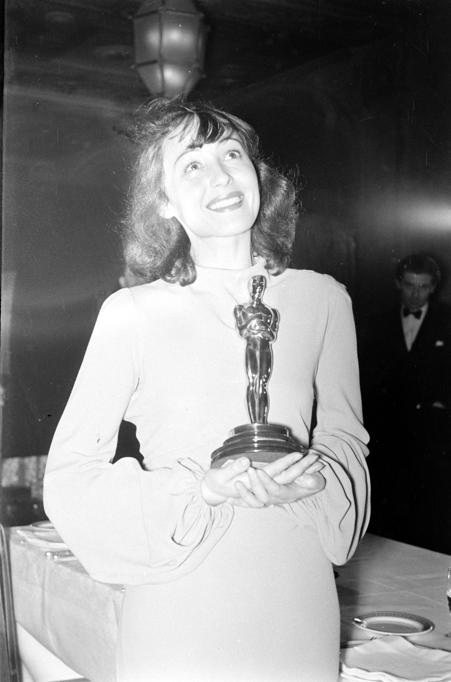 Luise Rainer, the first woman to win two Oscars, holds her Best Actress award for her performance in The Great Ziegfeld during the 1937 Academy Awards ceremony.