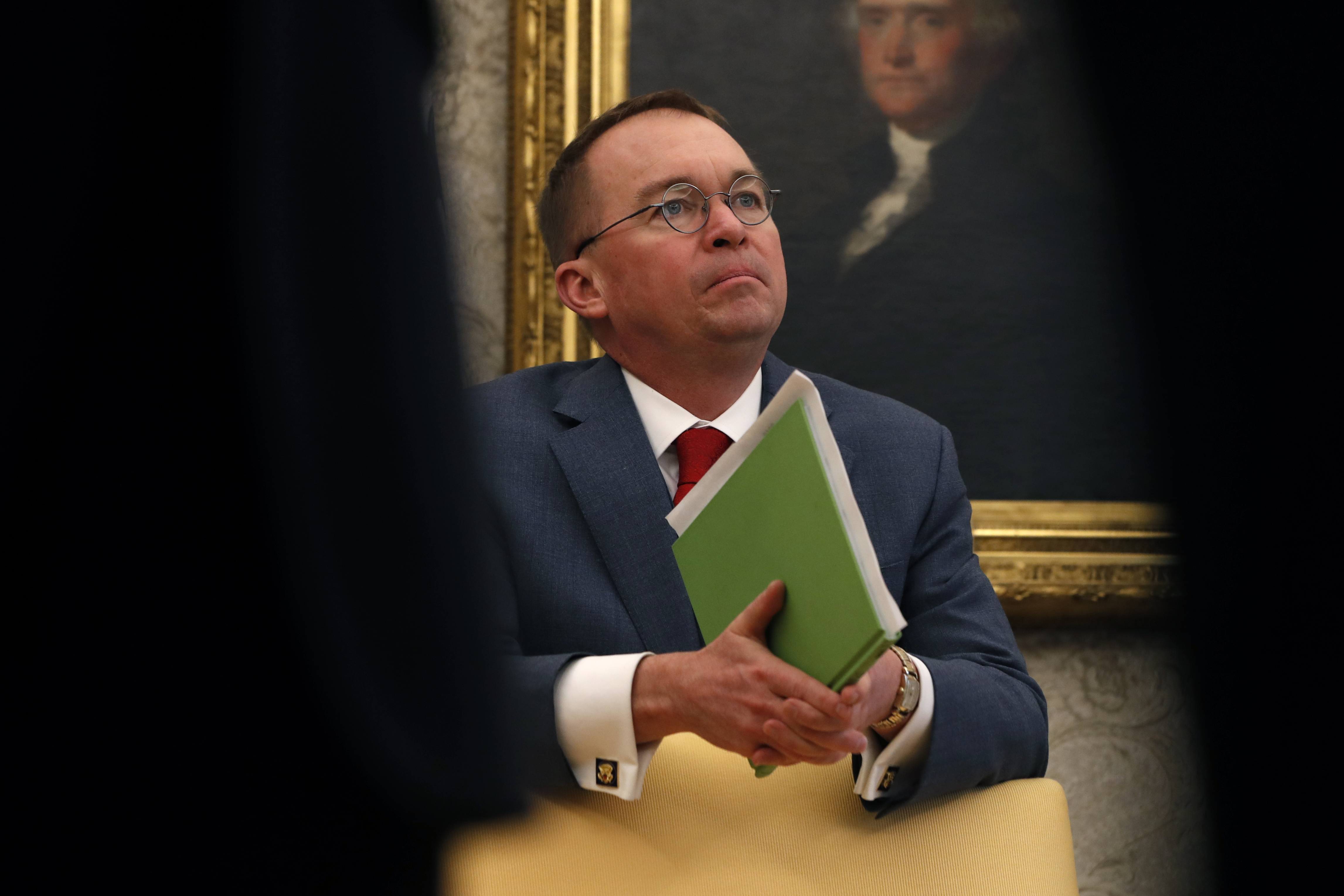 Acting White House chief of staff Mick Mulvaney listens as President Donald Trump speaks during a meeting with American manufacturers in the Oval Office of the White House, Thursday, Jan. 31, 2019, in Washington D.C. (Jacquelyn Martin&mdash;AP)
