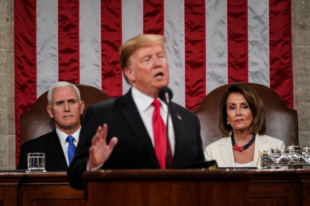 Speaker Nancy Pelosi and Vice President Mike Pence look on as U.S. President Donald Trump delivers the State of the Union address in the chamber of the U.S. House of Representatives at the U.S. Capitol Building on February 5, 2019 in Washington, DC. (Pool&mdash;Getty Images)
