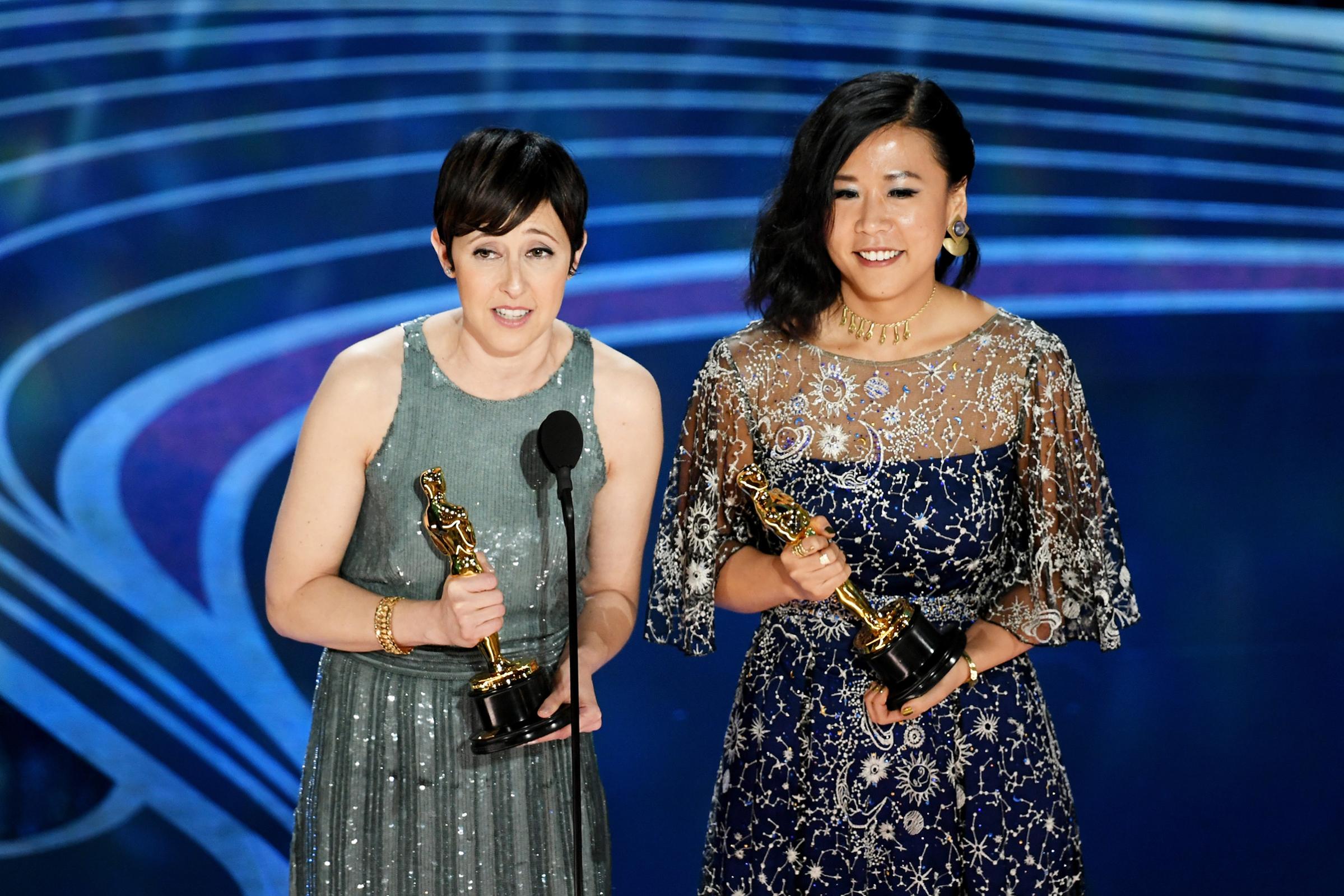 Becky Neiman-Cobb and Domee Shi accept the Short Film (Animated) award for 'Bao' onstage during the 91st Annual Academy Awards at Dolby Theatre on Feb. 24, 2019.