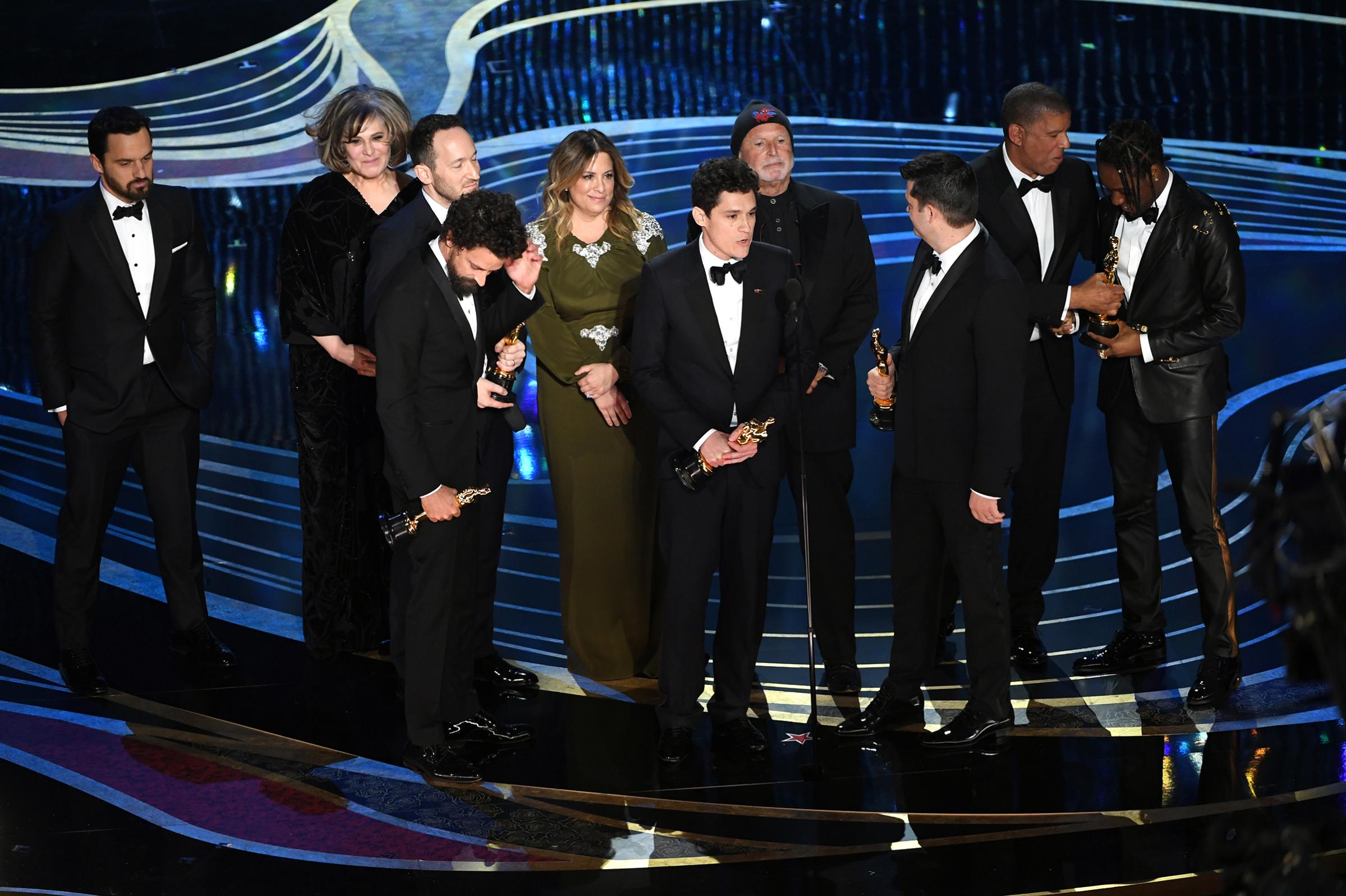 Crew of 'Spider-Man: Into the Spider-Verse' accept the Animated Feature Film award onstage during the 91st Annual Academy Awards at Dolby Theatre on Feb. 24, 2019.