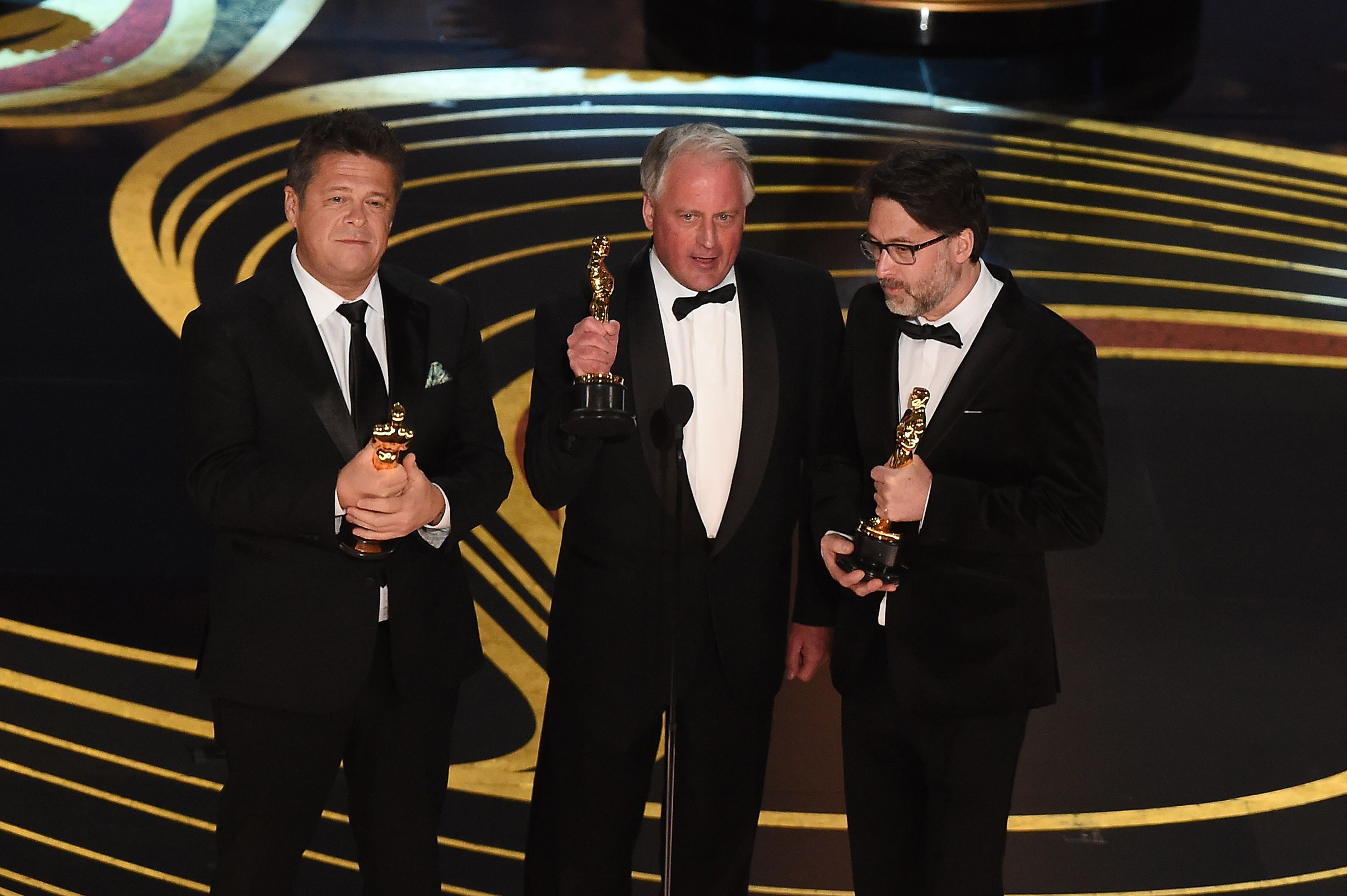 Best Sound Mixing nominees for "Bohemian Rhapsody" Paul Massey, Tim Cavagin and John Casali accepts the award for Best Sound Mixing during the 91st Annual Academy Awards at the Dolby Theatre in Hollywood on Feb. 24, 2019. (Valerie Macon—AFP/Getty Images)