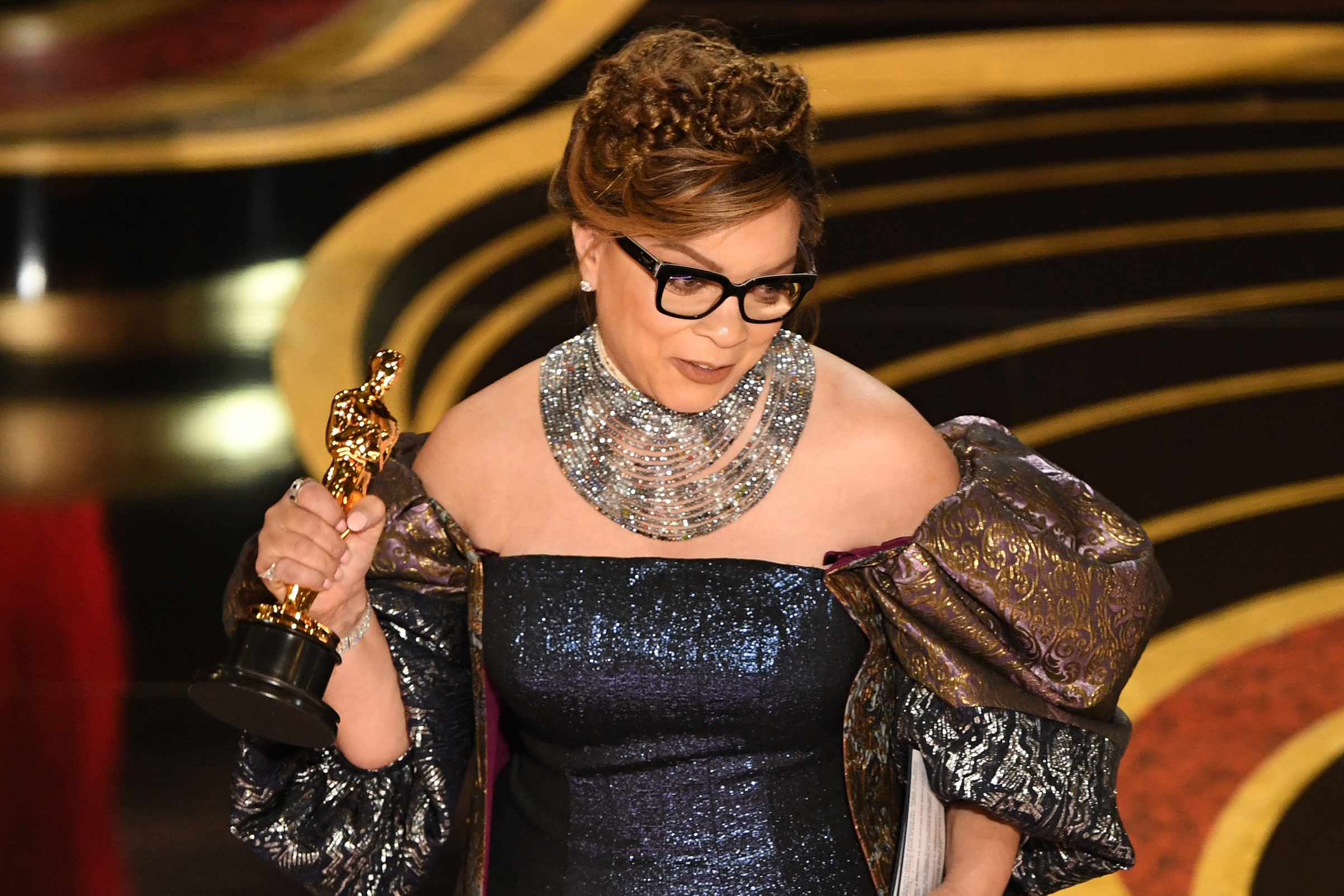 Best Costume Design nominee for "Black Panther" Ruth E. Carter accepts her Oscar during the 91st Annual Academy Awards at the Dolby Theatre in Hollywood on Feb. 24, 2019. (Valerie Macon—AFP/Getty Images)
