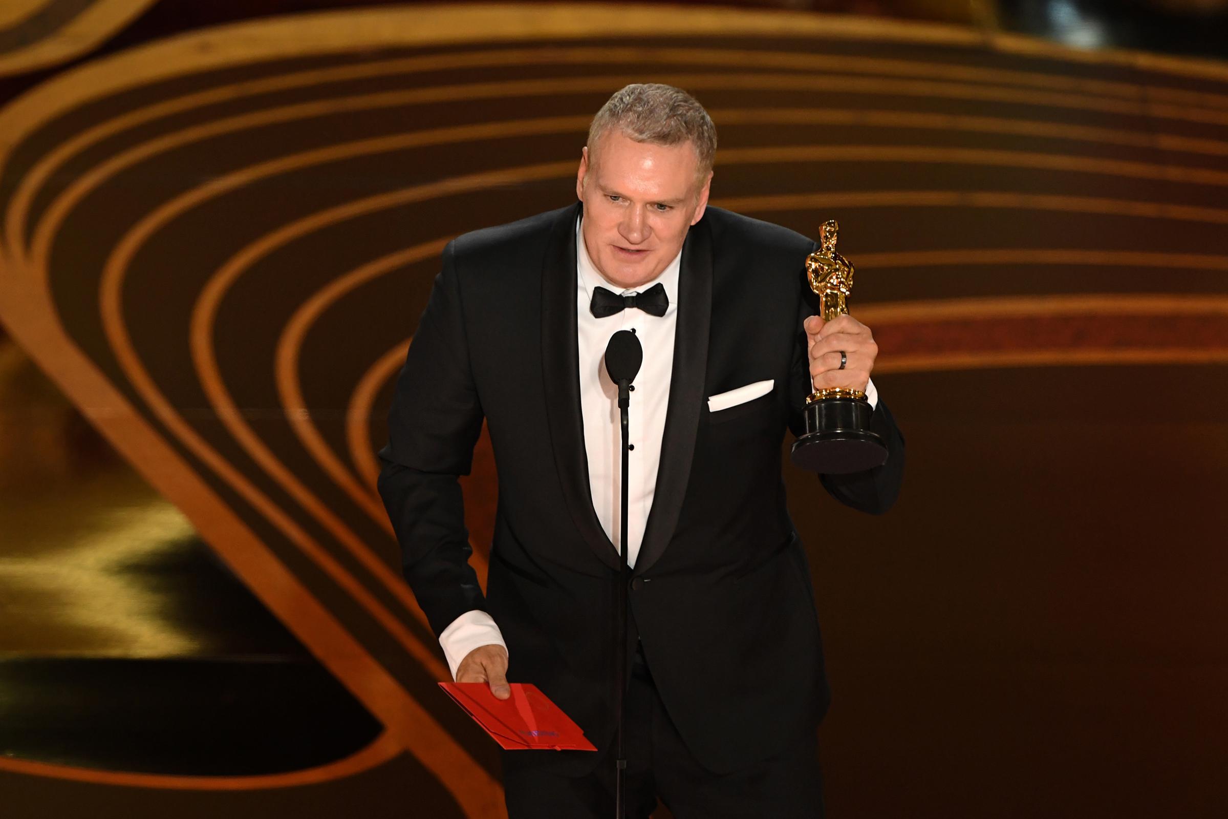 Best Film Editing nominee for "Bohemian Rhapsody" John Ottman accepts the award for Best Film Editing during the 91st Annual Academy Awards at the Dolby Theatre in Hollywood on Feb. 24, 2019.