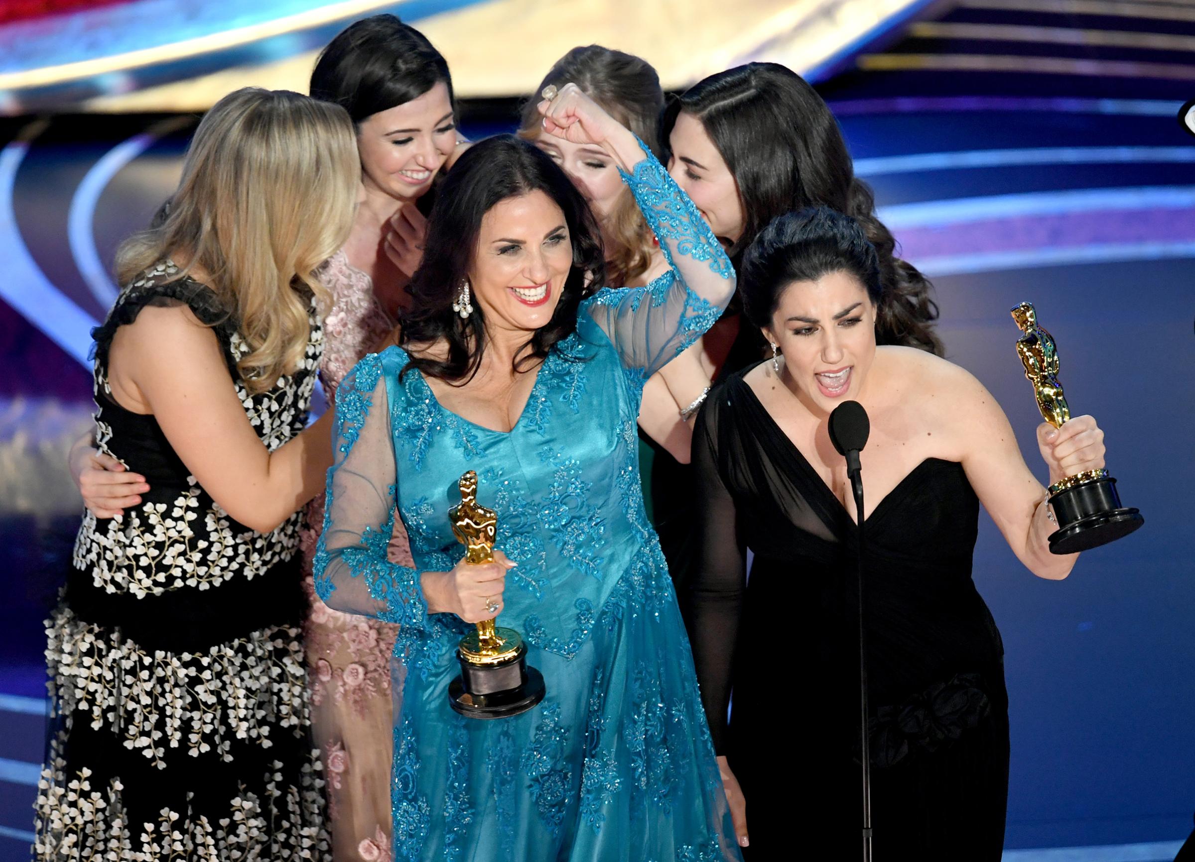 Melissa Berton and Rayka Zehtabchi accept the Documentary (Short Subject) award for 'Period. End of Sentence.' onstage during the 91st Annual Academy Awards at Dolby Theatre on Feb. 24, 2019.