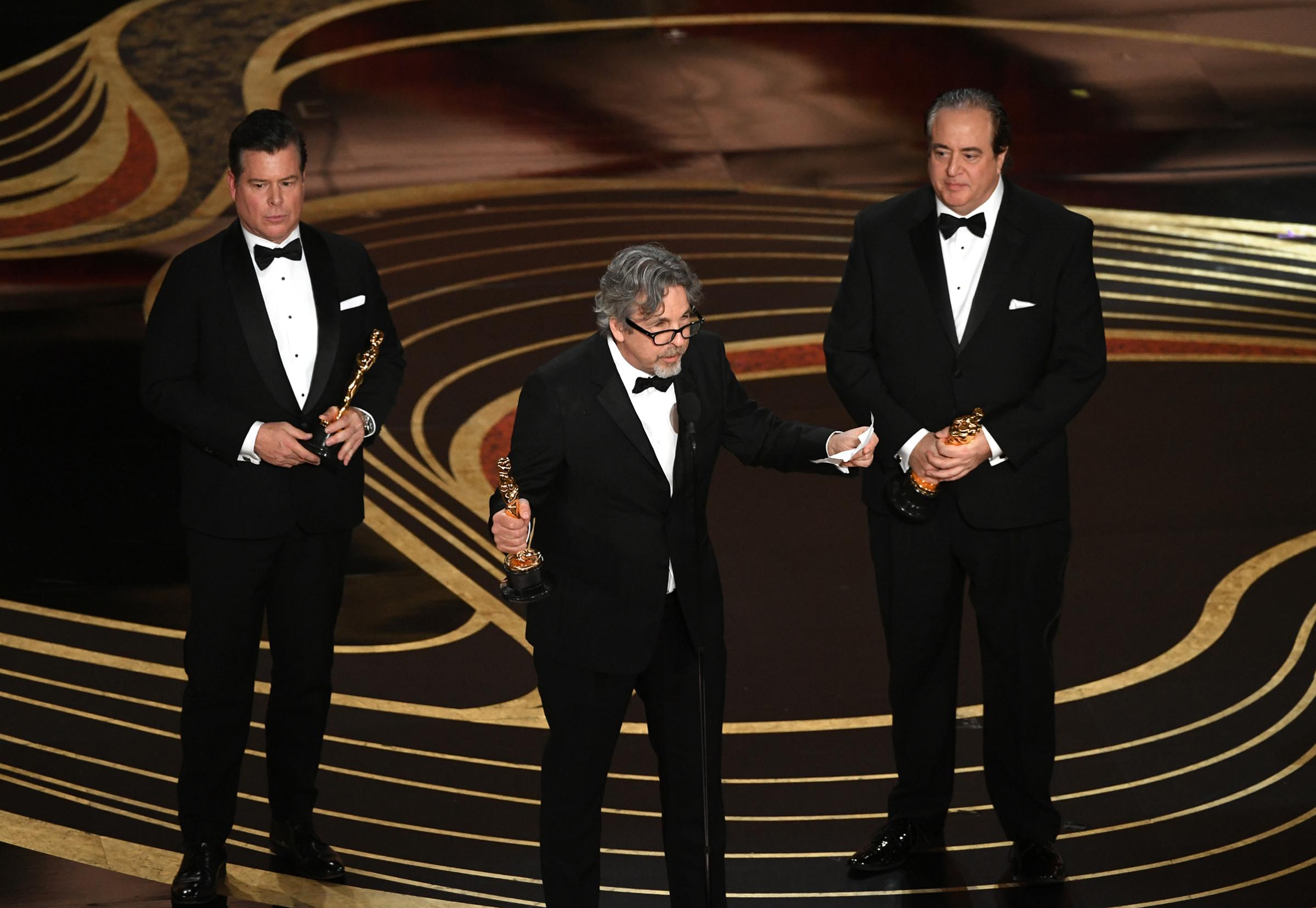 Brian Currie, Peter Farrelly, and Nick Vallelonga accept the Original Screenplay award for 'Green Book' onstage during the 91st Annual Academy Awards at Dolby Theatre on Feb. 24, 2019.