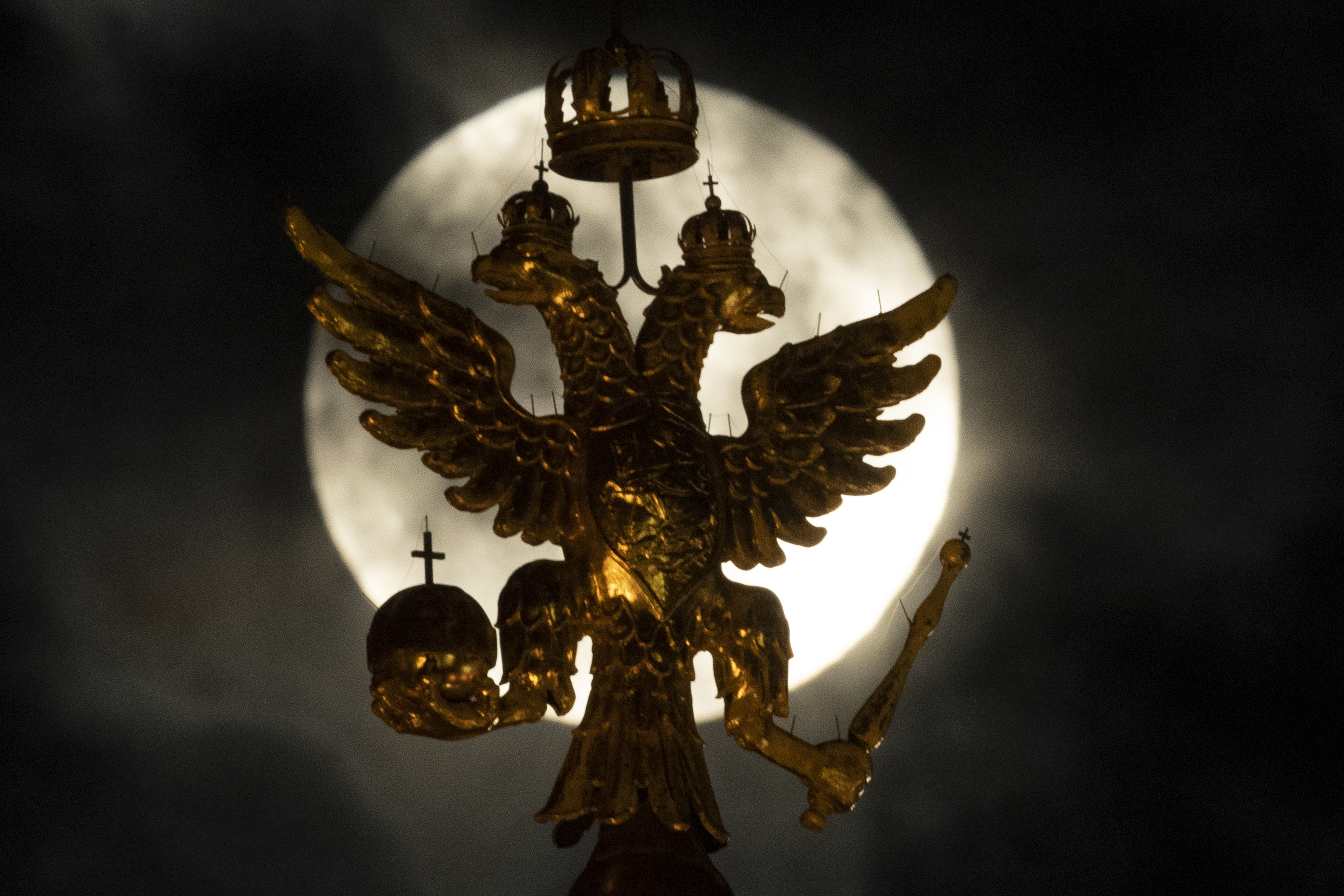 Feb. 19, 2019. Russia's state symbol, the double-headed eagle, is pictured against the full moon, in Moscow, Russia. (Maksim Blinov—Sputnik via AP)
