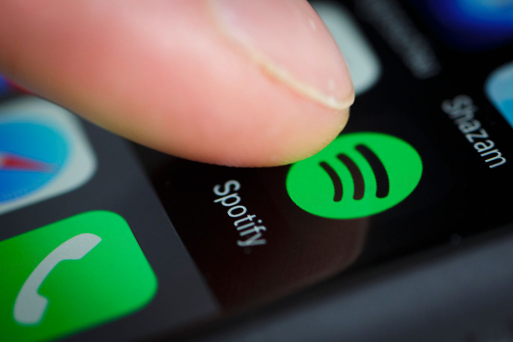 The logo of streaming service Spotify is displayed on the screen of a smartphone. (Thomas Trutschel&mdash;Photothek/Getty Images)