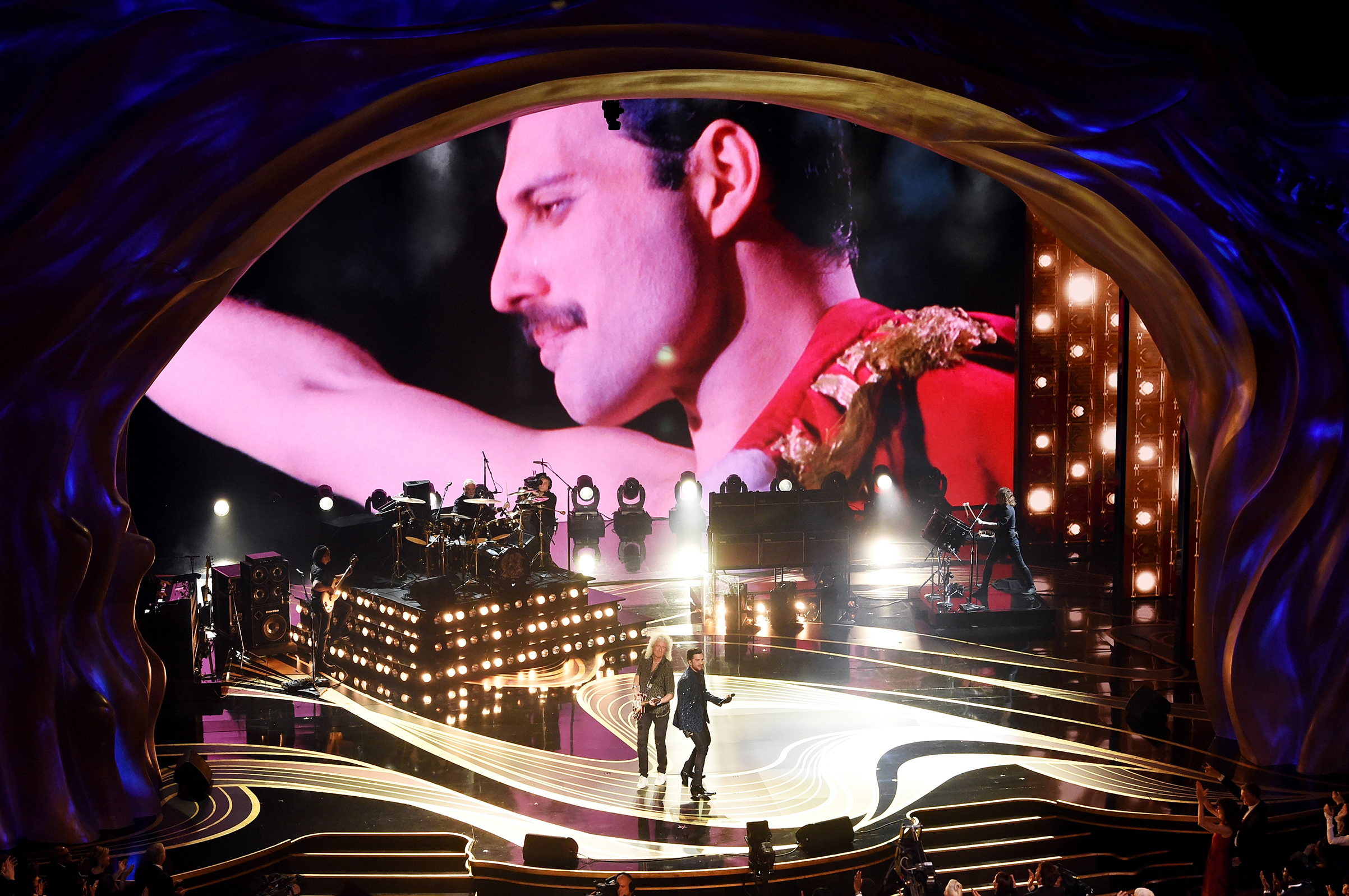 An image of the late Freddie Mercury is projected onto a screen while Adam Lambert + Queen perform onstage during the 91st Annual Academy Awards at Dolby Theatre on Feb. 24, 2019. (Kevin Winter—Getty Images)