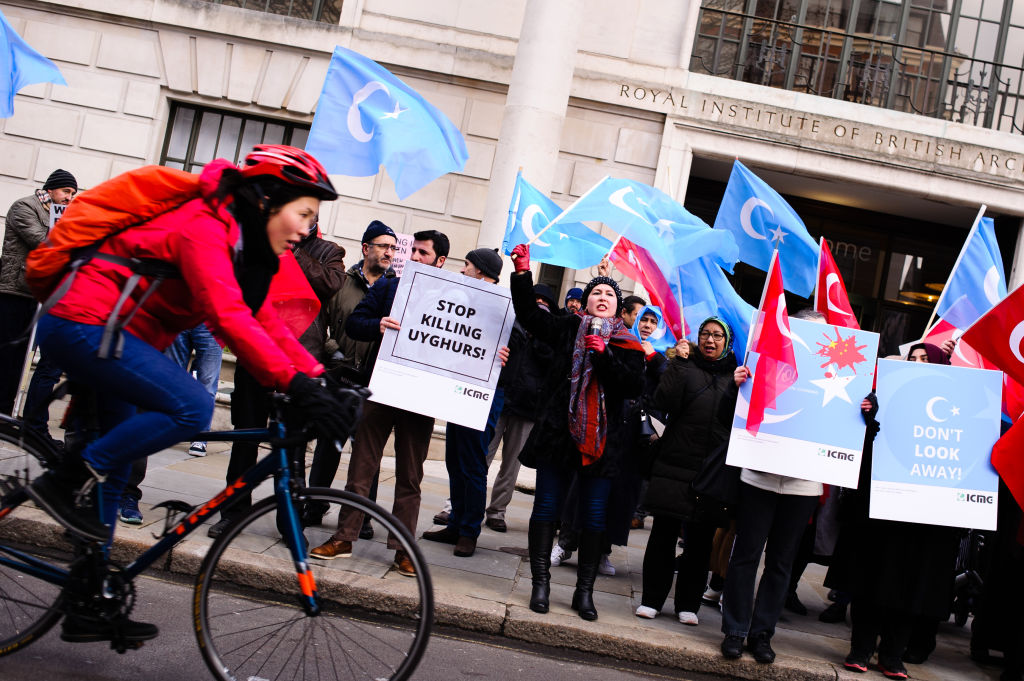 Activists protest the treatment of Uyghur Muslims by Chinese authorities in the East Turkestan region of China's Xinjiang province at a protest outside the Chinese embassy in London, England, on Feb. 2, 2019. On Feb. 9, 2019 Turkey demanded China close "concentration camps" holding the Muslim Uighur minority. (NurPhoto—NurPhoto via Getty Images)