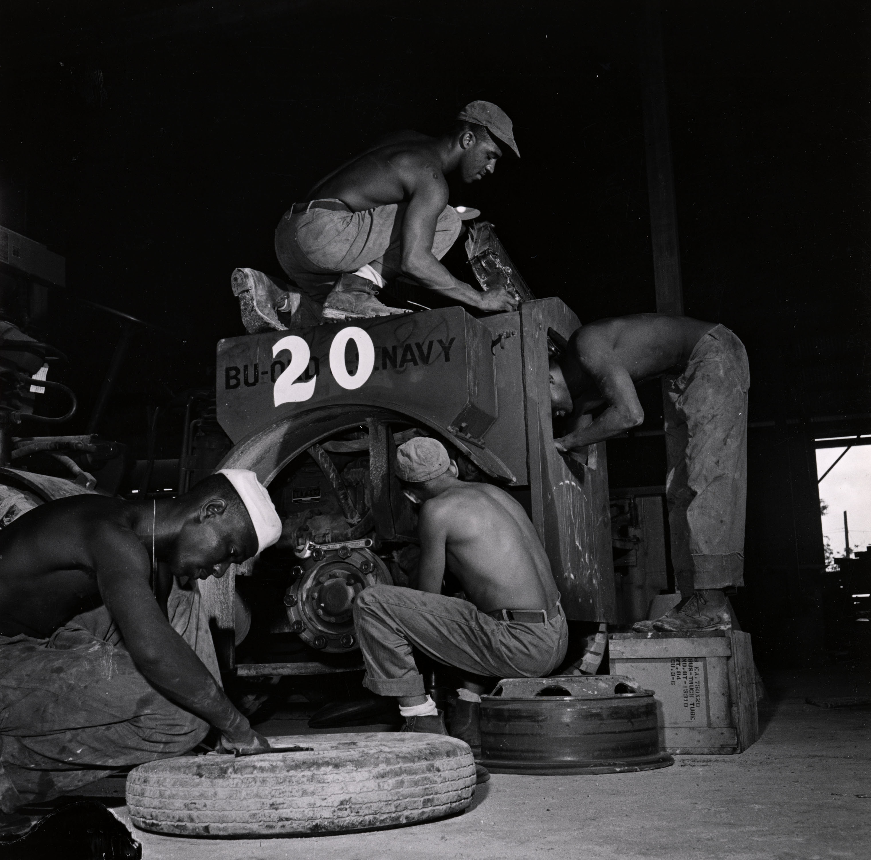 Sailors assigned to work as laborers at the US Naval Supply Depot on Guam. (Wayne Miller—Magnum Photos)