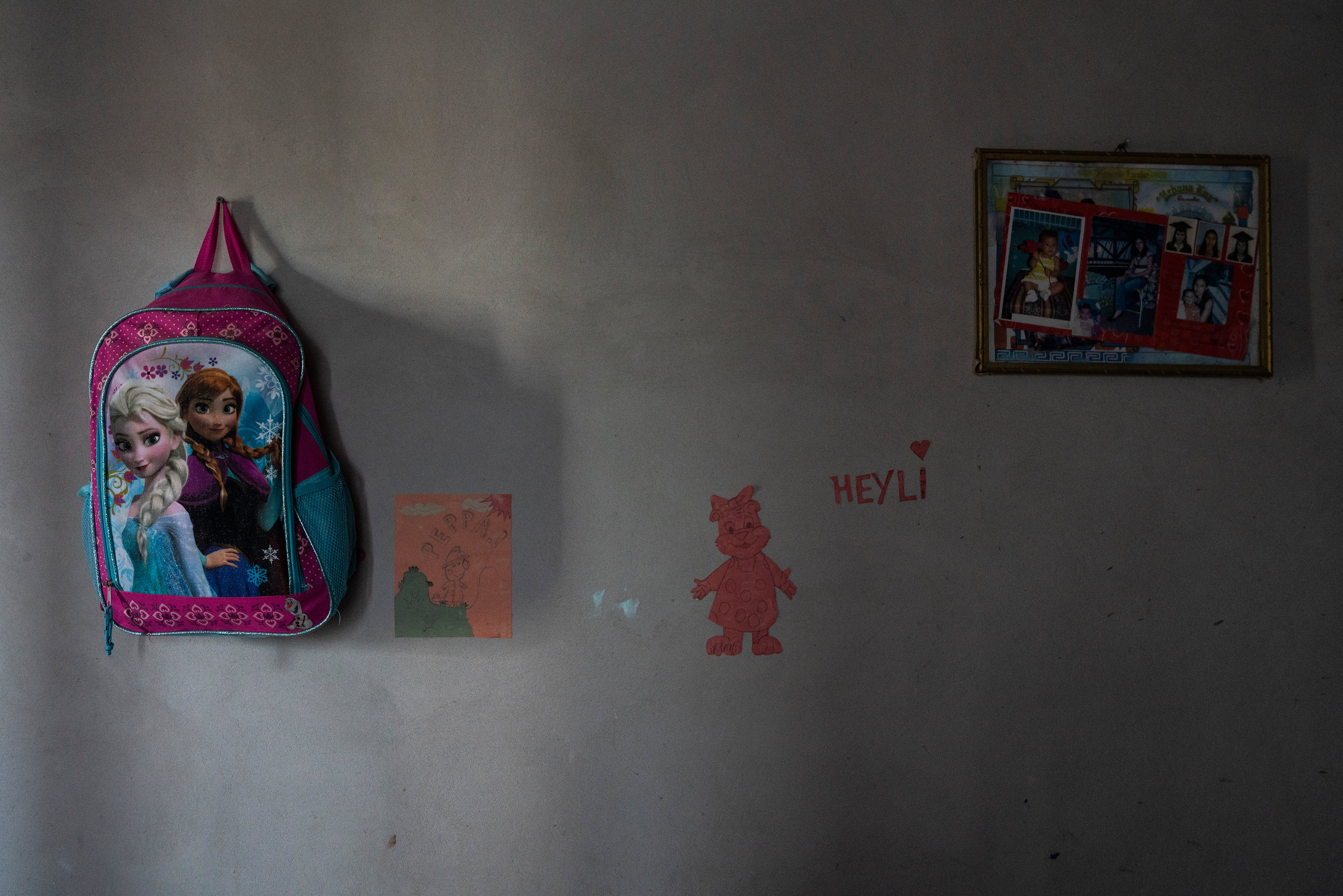 Belongings that Heyli, left behind hang on a wall in a house her parents leased in Olancho, Honduras. (Veronica G. Cardenas for TIME and The Texas Tribune)
