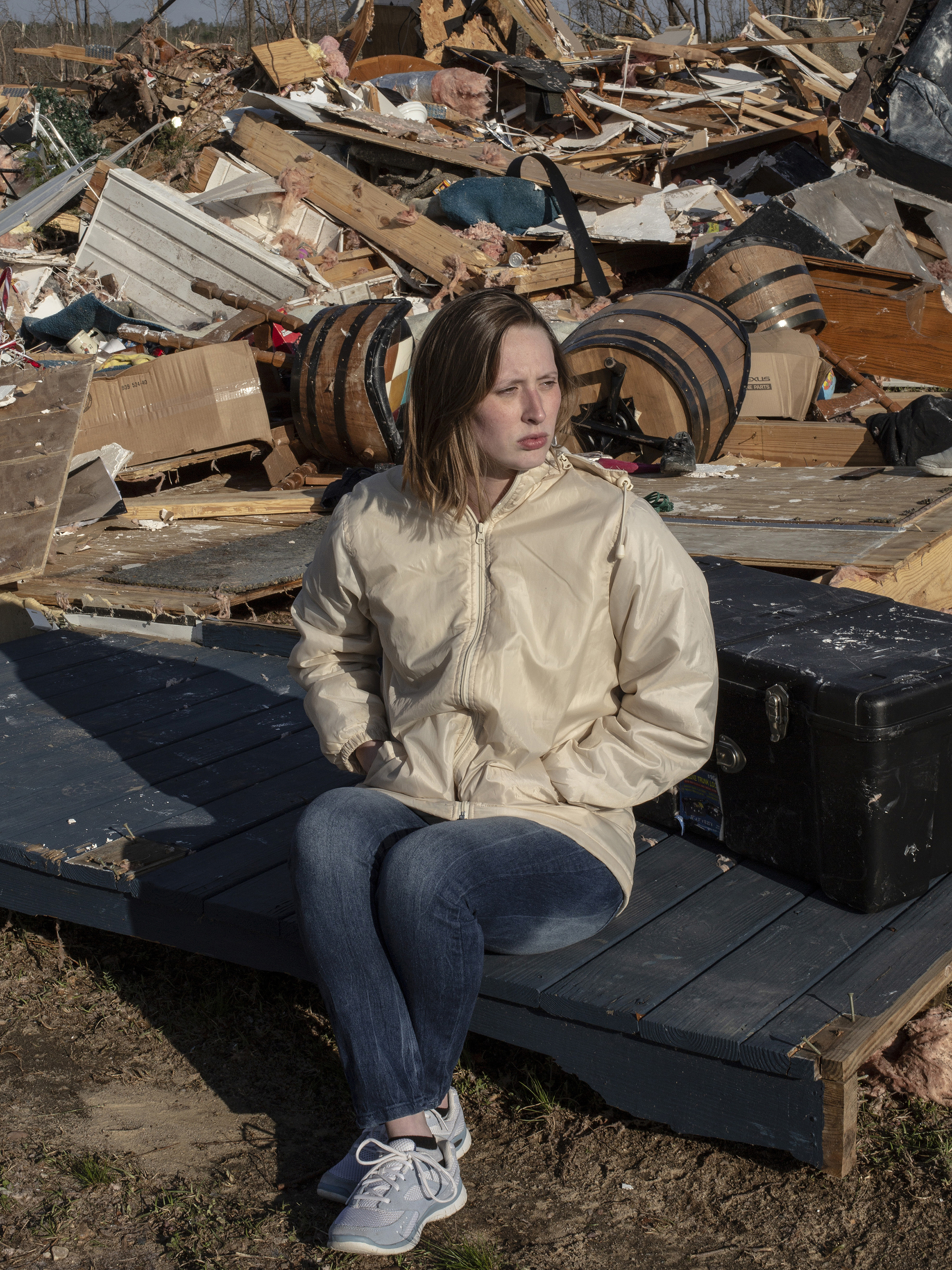 Jessica Chandler poses for a portrait in her neighborhood, which was destroyed after a tornado passed over killing 23 people and destroying homes in Beauregard, Alabama on March 4, 2019. (Bryan Anselm—Redux for TIME)