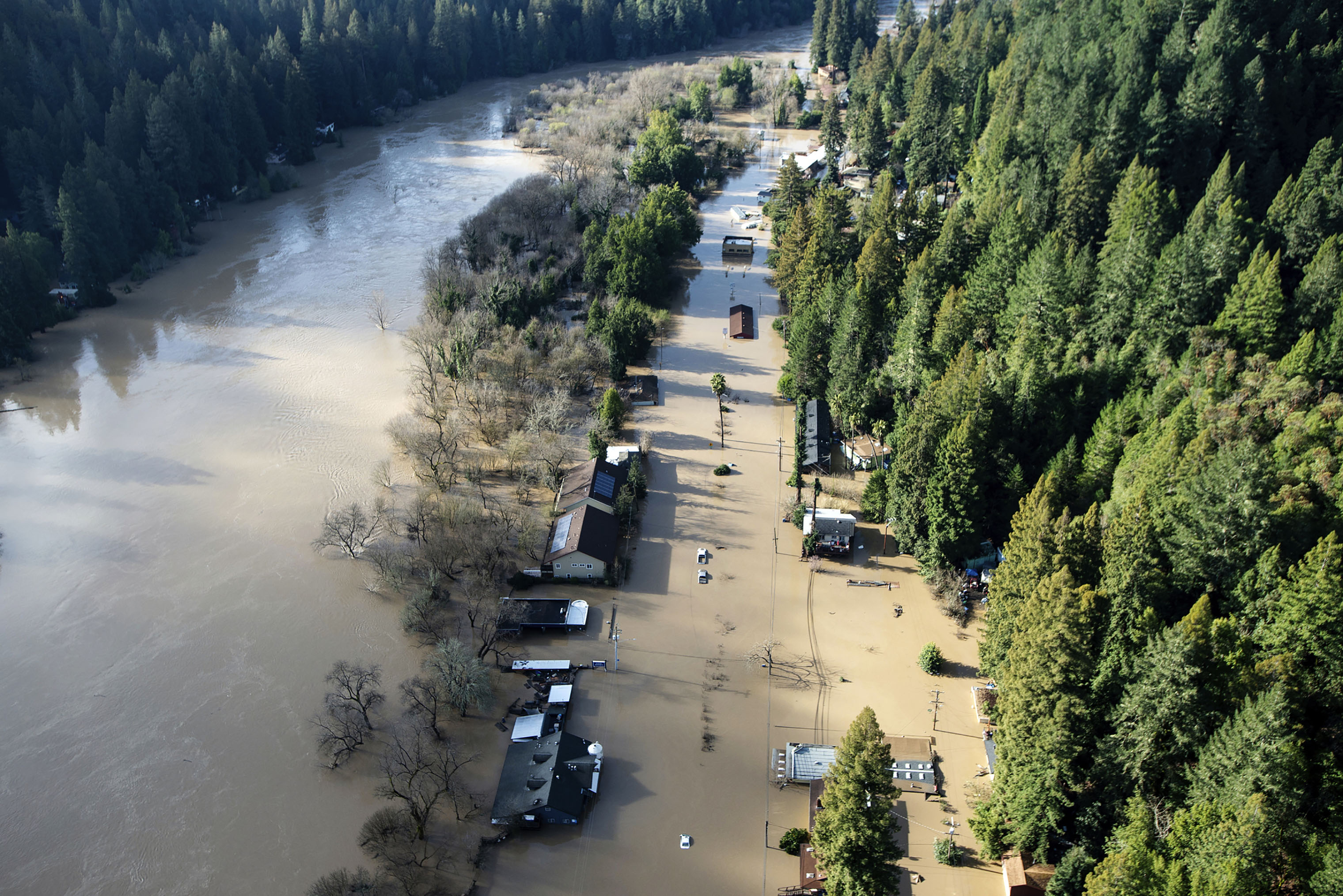 Flood waters from the Russian River partially submerge properties in Guerneville, Calif., on Feb. 28, 2019. The river in the wine country north of San Francisco reached its highest level in 25 years Wednesday night. (Josh Edelson—AP)