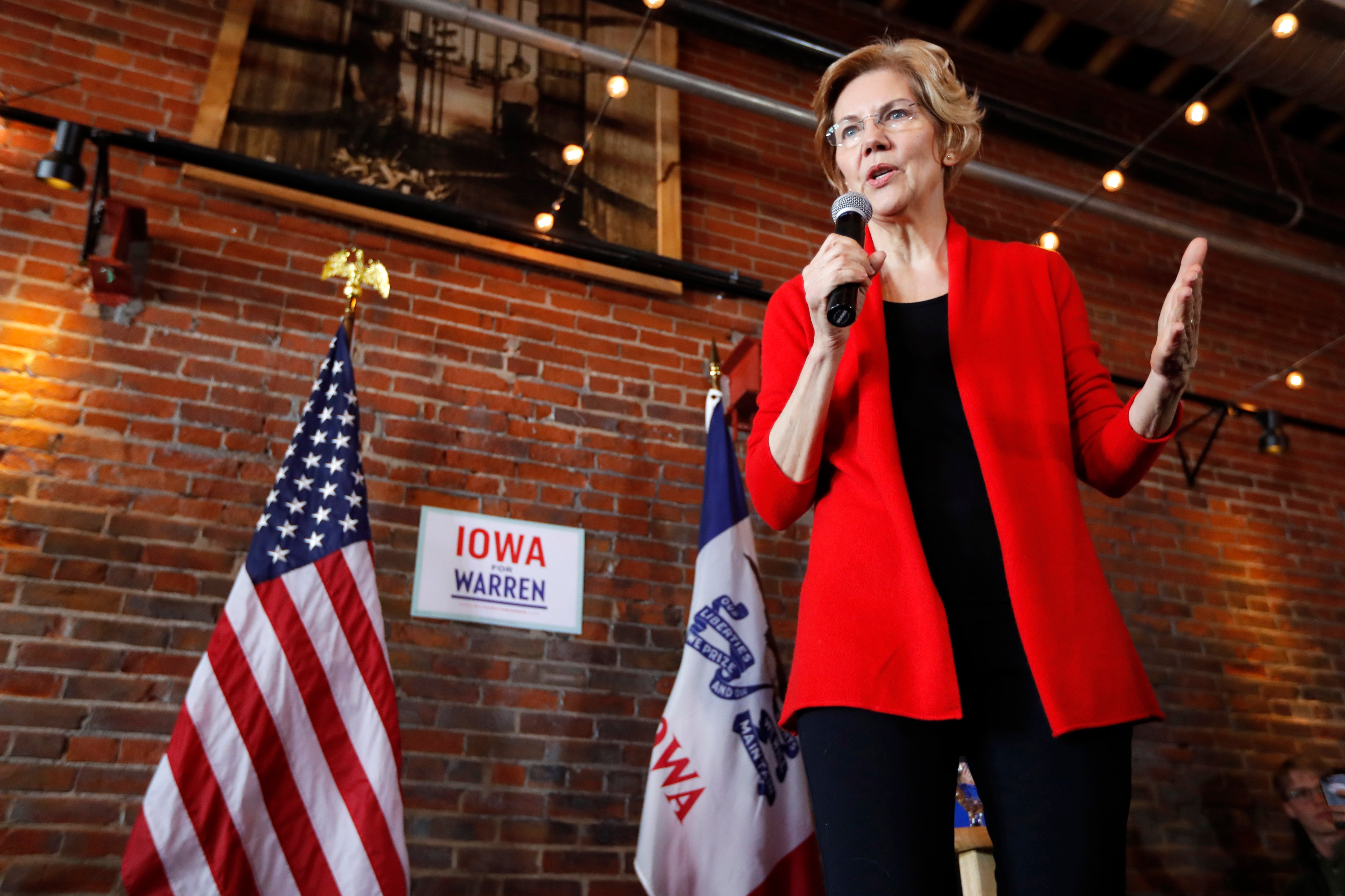 2020 Democratic presidential candidate Sen. Elizabeth Warren speaks to local residents during an organizing event Mar. 1, 2019, in Dubuque, Iowa. Warren is proposing to break up the large tech companies like Amazon, Google and Facebook on Mar. 8. (Charlie Neibergall—AP)