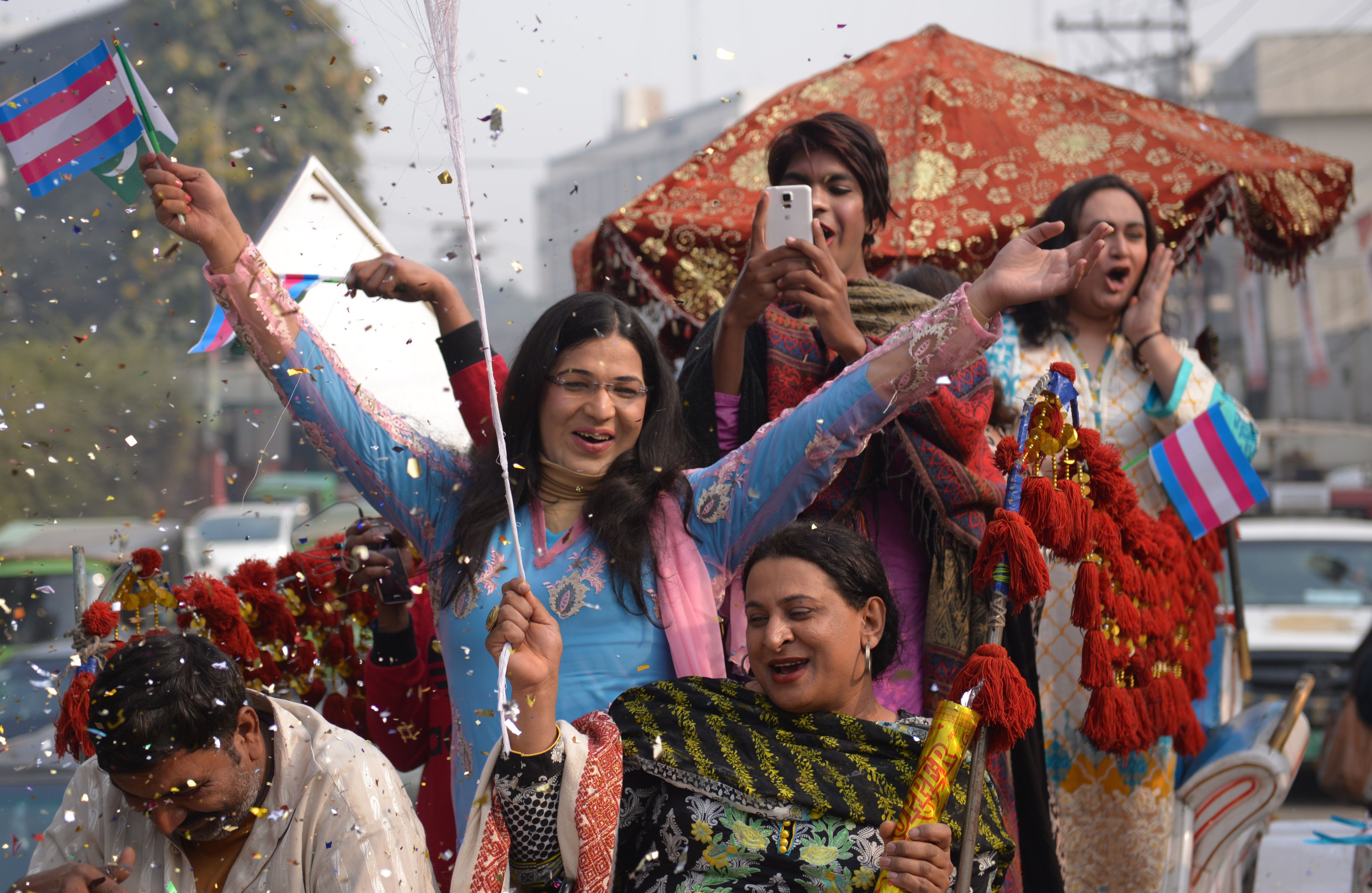 Members of the Pakistani transgender community parade during a rally to demand for the implementation of the transgender rights bill in Lahore on December 29, 2018. (Arif Ali—AFP/Getty Images)