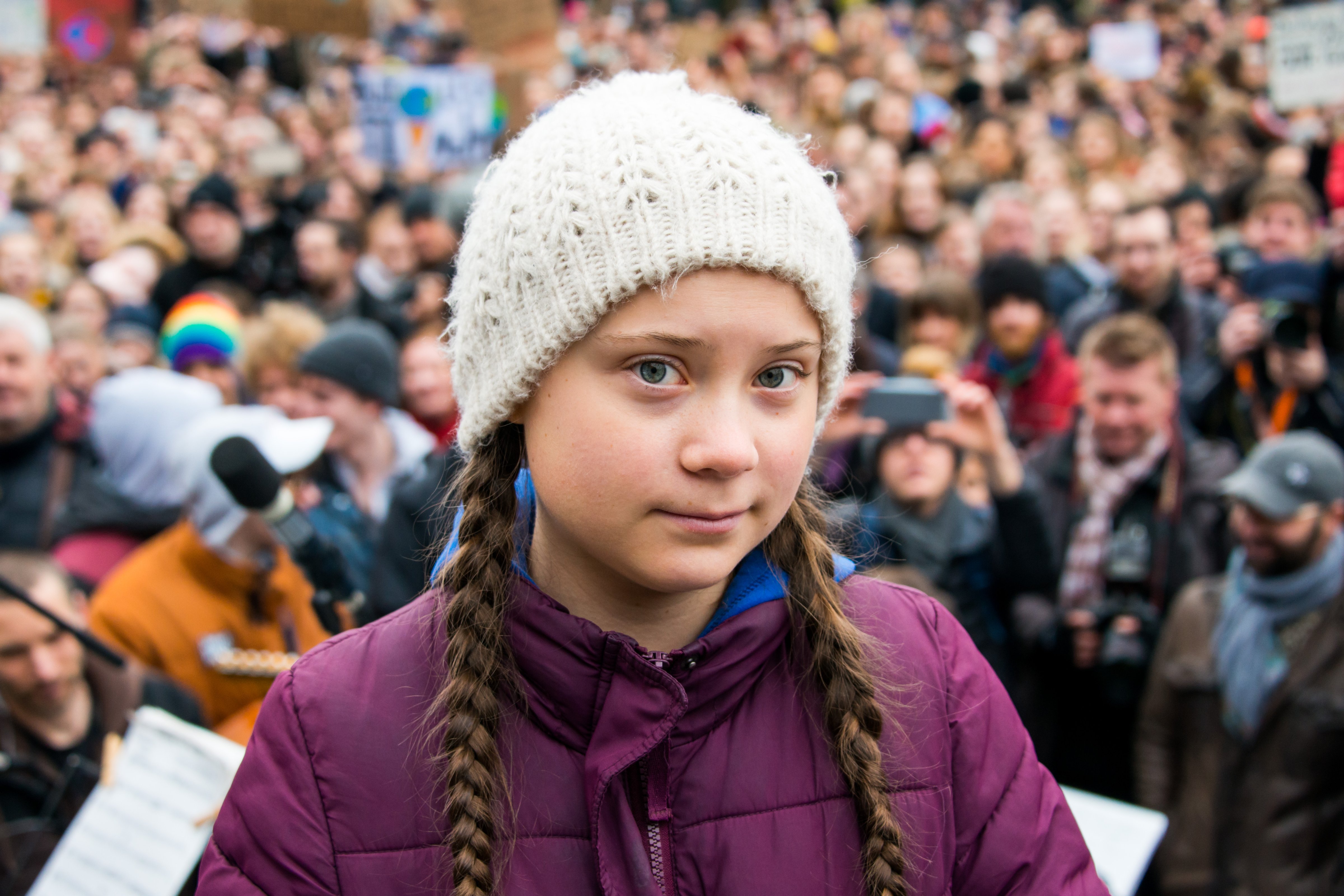 Greta Thunberg, climate activist, stands on a stage during a rally at the town hall market in Hamburg, Germany, on Mar. 1, 2019. (Daniel Bockwoldt—Getty Images)