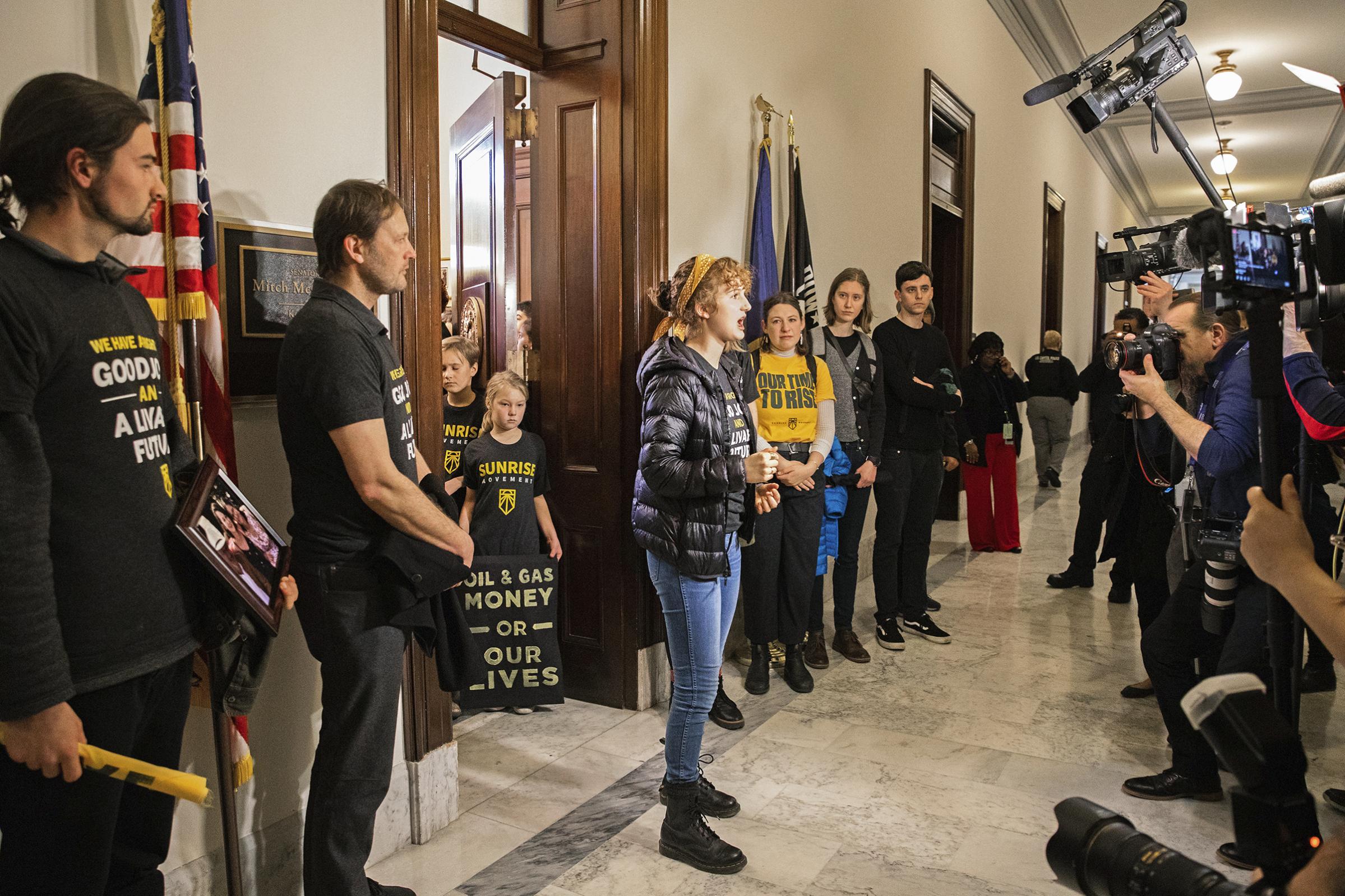 Sunrise Movement activists call for a Green New Deal on Capitol Hill