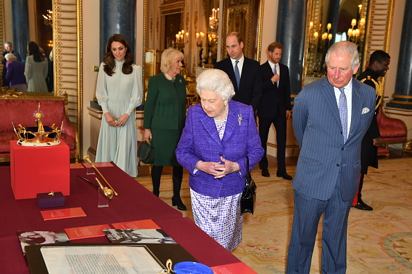 Catherine, Duchess of Cambridge, Camilla, Duchess of Cornwall, Prince William, Duke of Cambridge, Prince Harry, Duke of Sussex, Queen Elizabeth II and Prince Charles, Prince of Wales attend a reception to mark the fiftieth anniversary of the investiture of the Prince of Wales at Buckingham Palace in London on March 5, 2019.