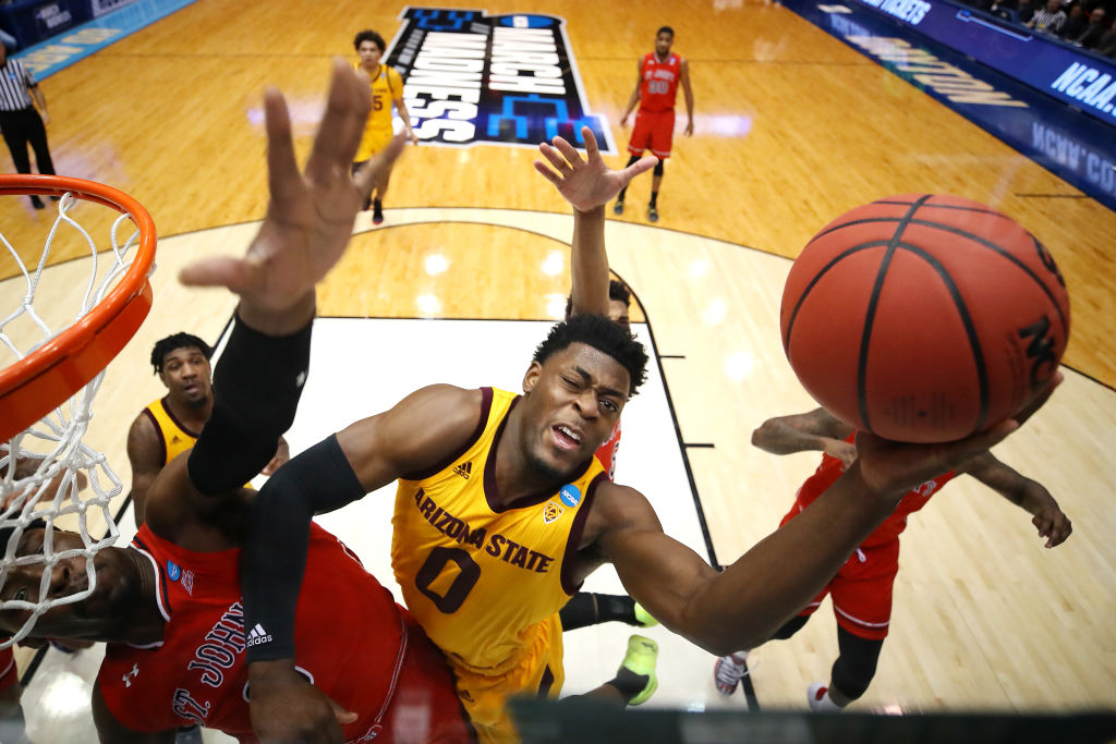 Luguentz Dort #0 of the Arizona State Sun Devils drives to the basket against Sedee Keita #0 of the St. John's Red Storm during the first half in the First Four of the 2019 NCAA Men's Basketball Tournament at UD Arena on March 20, 2019 in Dayton, Ohio. (Gregory Shamus&mdash;Getty Images)