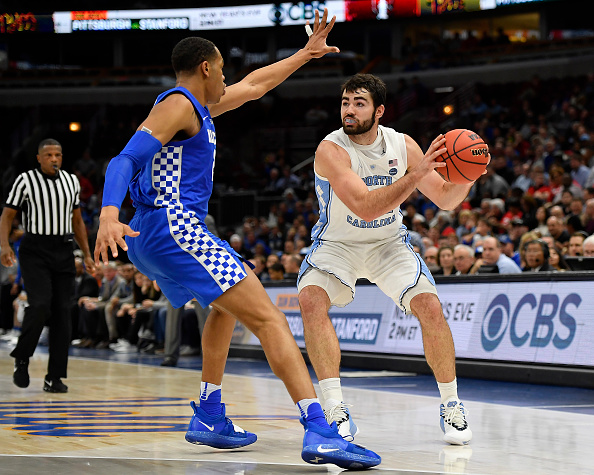 North Carolina Tar Heels forward Luke Maye #32 handles the ball against Kentucky Wildcats forward PJ Washington #25 during the CBS Sports Classic at the United Center in Chicago, Illinois on December 22, 2018. (Quinn Harris—Icon Sportswire/Getty Images)