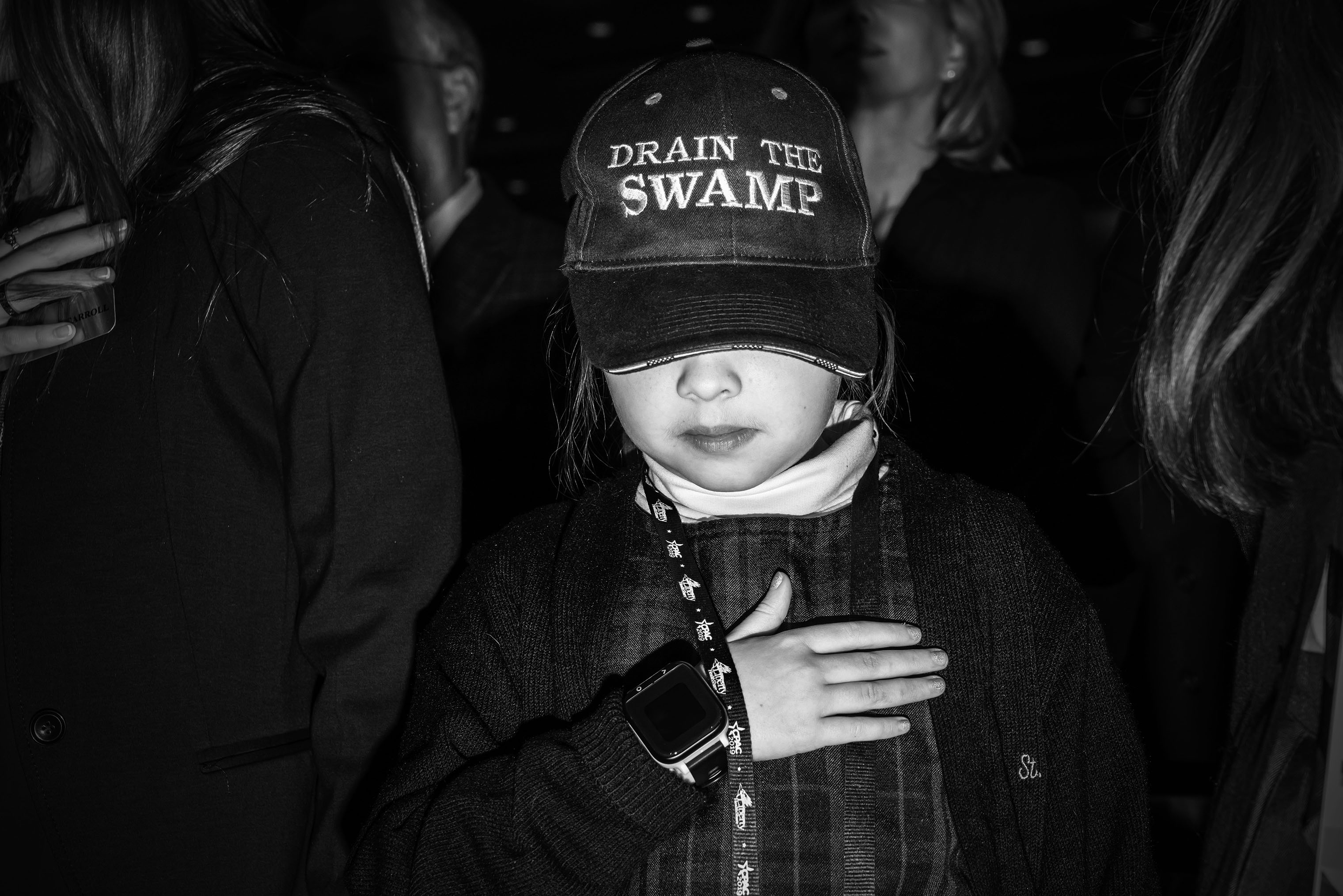 A young attendee shows support for President Donald Trump. (Mark Peterson—Redux for TIME)