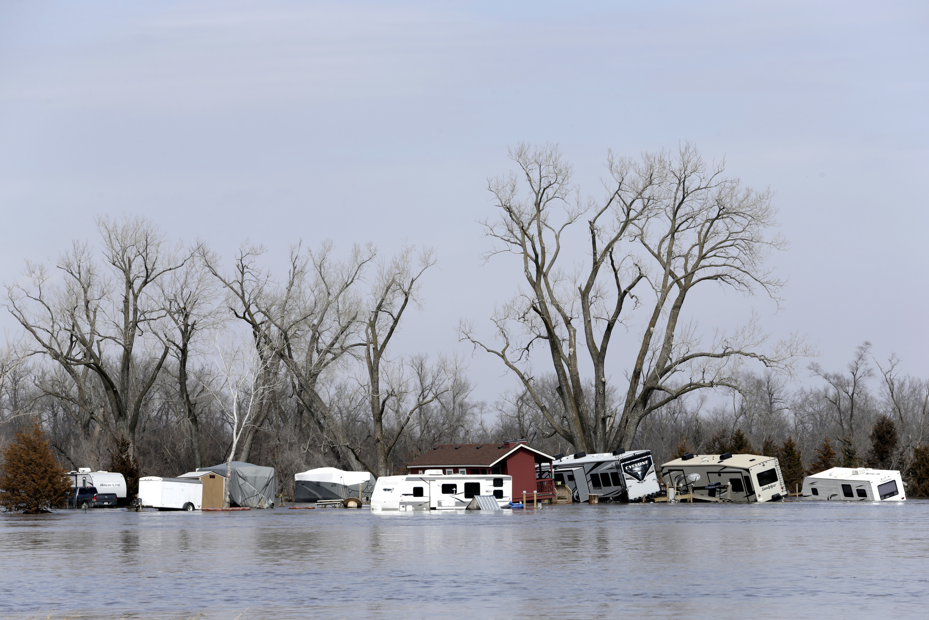RVs, washed away by the flood waters of the Platte River, are seen in Merritt's RV Park in Plattsmouth, Nebraska, March 17, 2019. (Nati Harnik—AP)