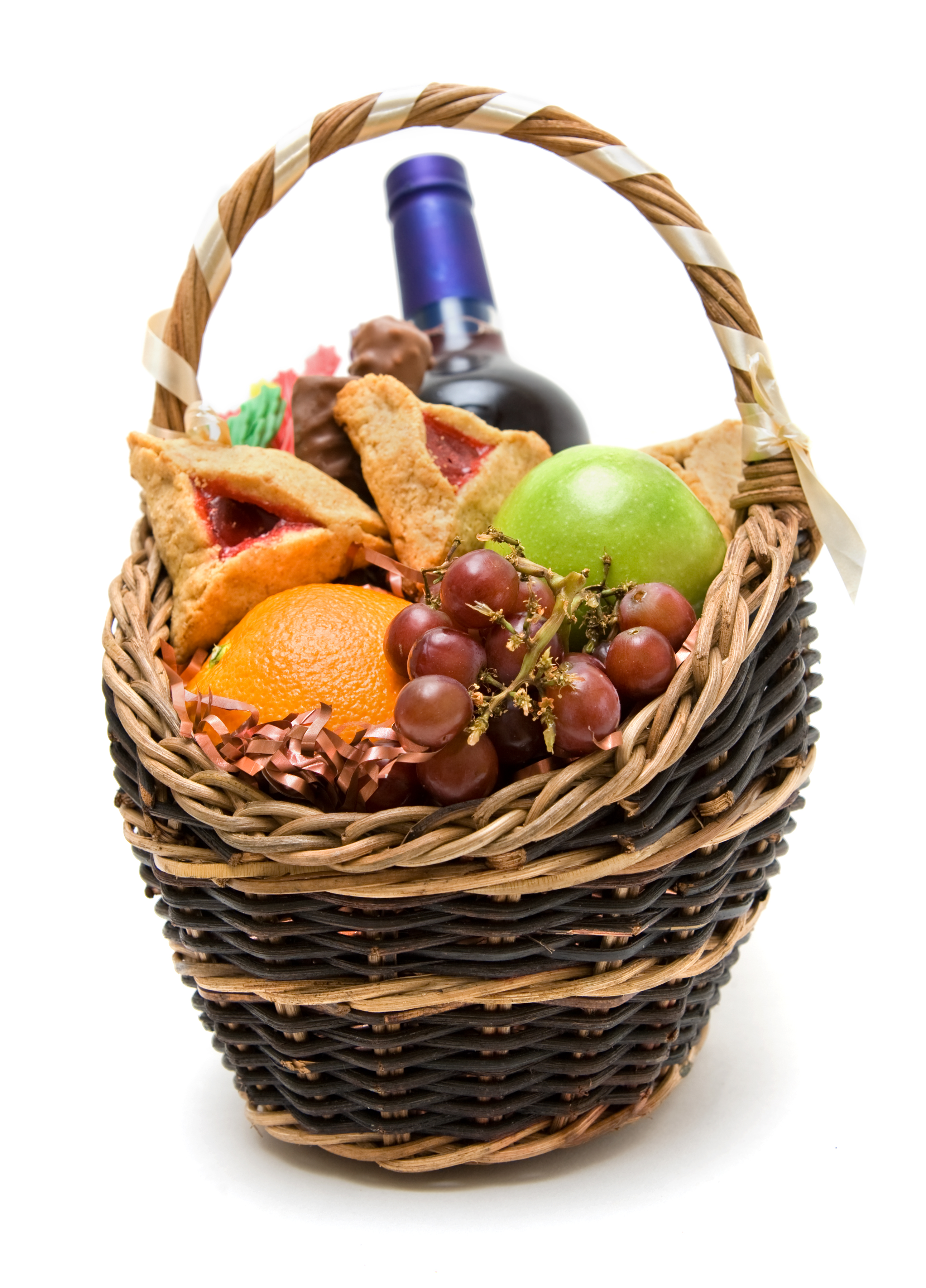 Purim basket with fruit, candy, wine and hamentaschen. (Tovfla—Getty Images/iStockphoto)