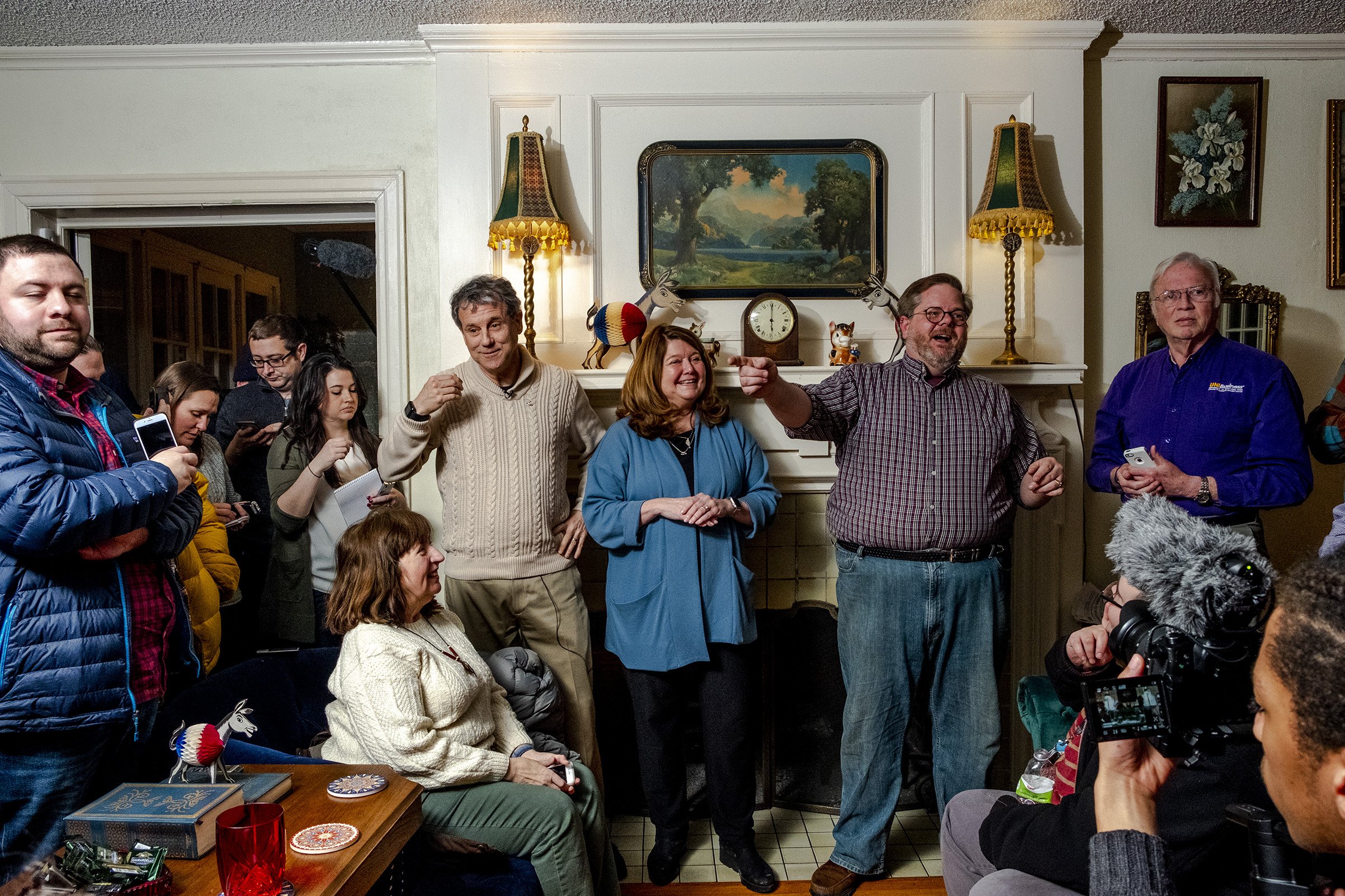 Sen. Brown and his wife Connie Schultz attend a meet and greet at the home of the Black Hawk County Supervisor Chris Schwartz, in Waterloo, IA on Feb. 2, 2019. (Devin Yalkin for TIME)