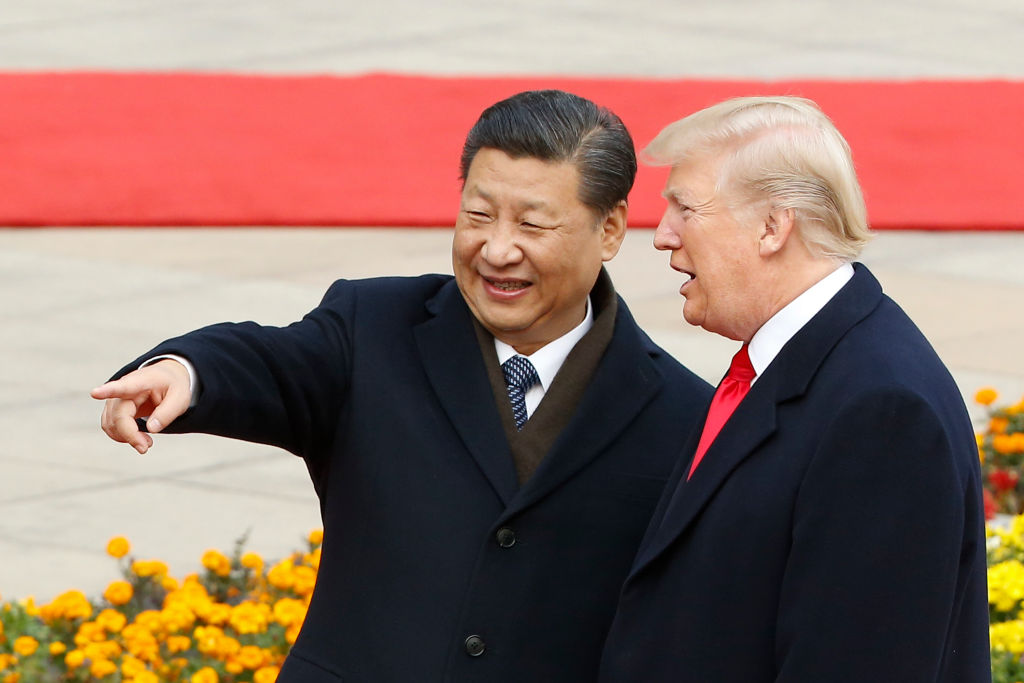 In this file photo, Chinese President Xi Jinping and U.S. President Donald Trump attend a welcoming ceremony Nov. 9, 2017 in Beijing, China. Trump and Jinping are close to finalizing a trade deal between their two nations. (Pool&mdash;Getty Images)