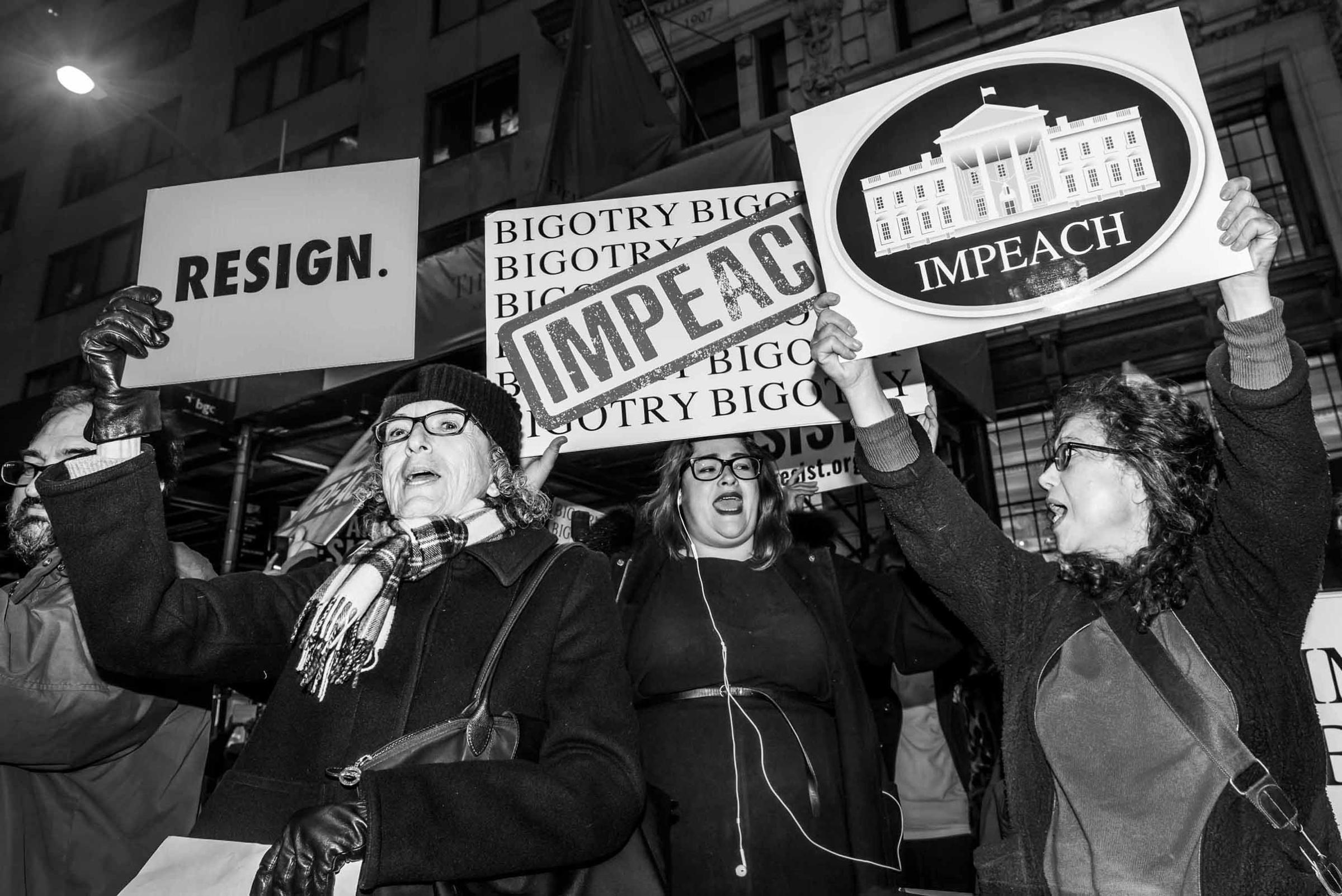 Activists gather outside a Trump-owned building in New York City in 2017 to rally for the President’s removal