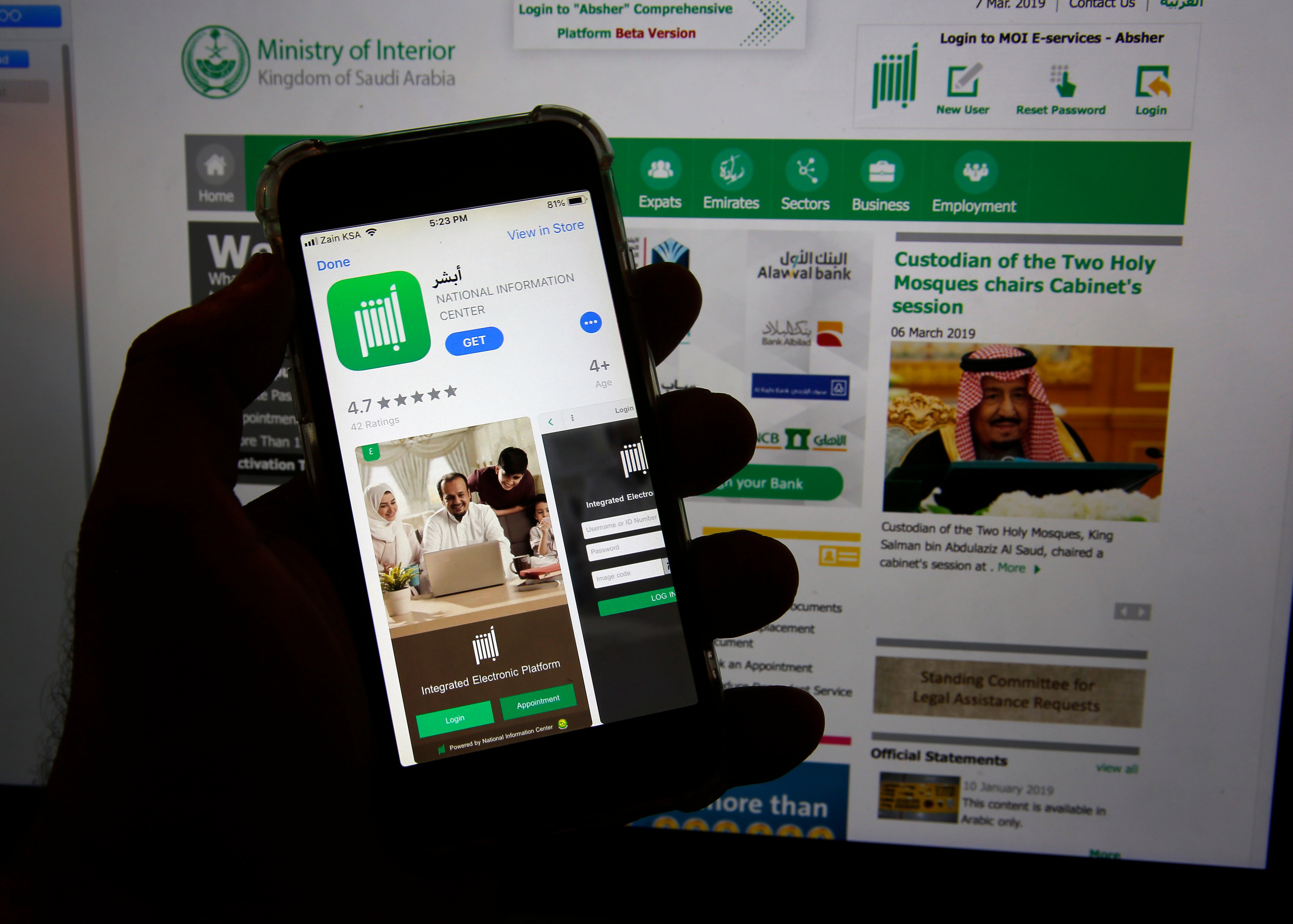 The Absher app is seen on a phone in Jiddah, Saudi Arabia on March 7, 2019. (Amr Nabil&mdash;AP)