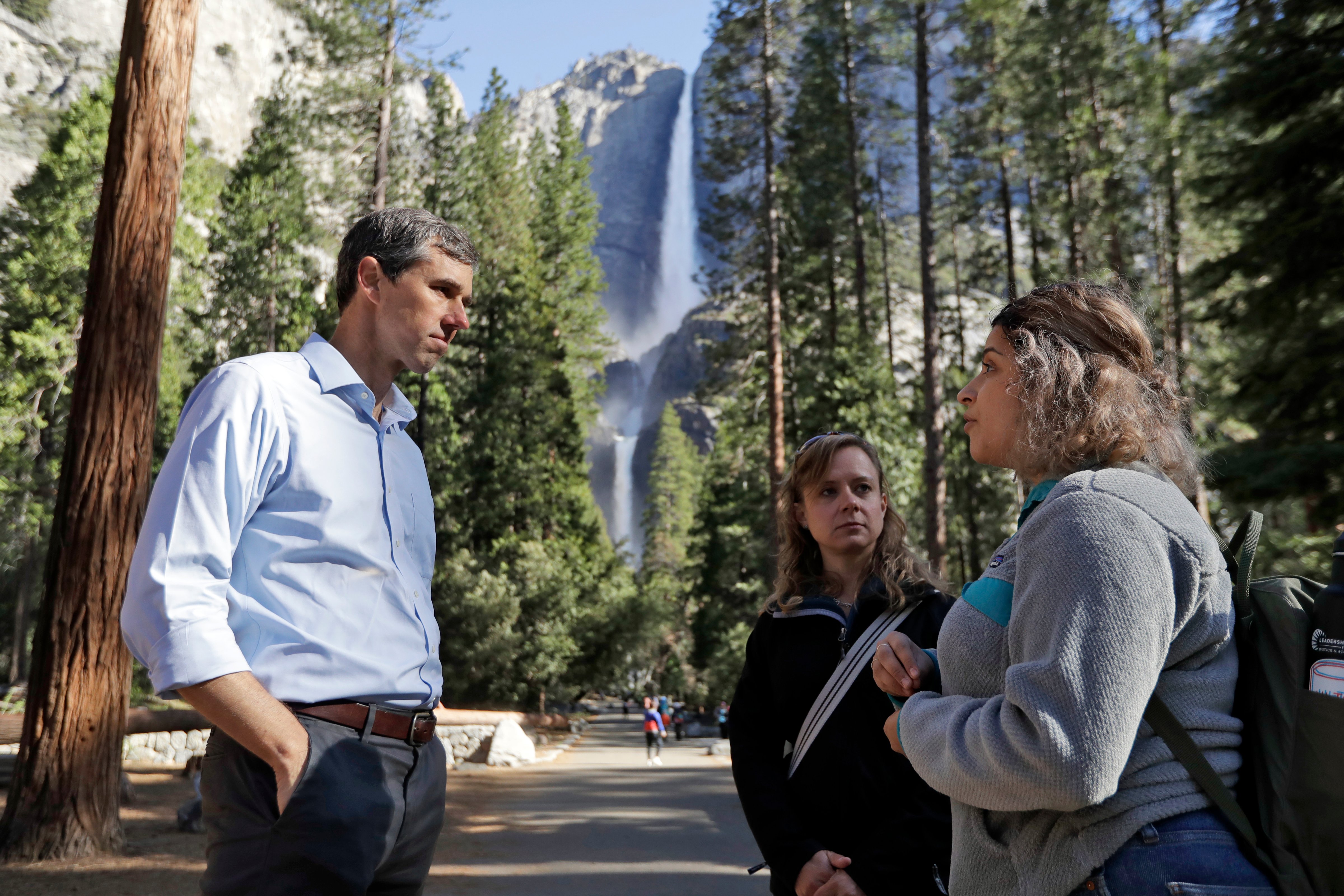 Democratic presidential candidate and former Texas congressman Beto O'Rourke, left, talks with Anne Kelly, center, Director of the Sierra Nevada Research Stations and environmental advocate Leslie Martinez center, Monday, April 29, 2019, in Yosemite National Park, Calif.