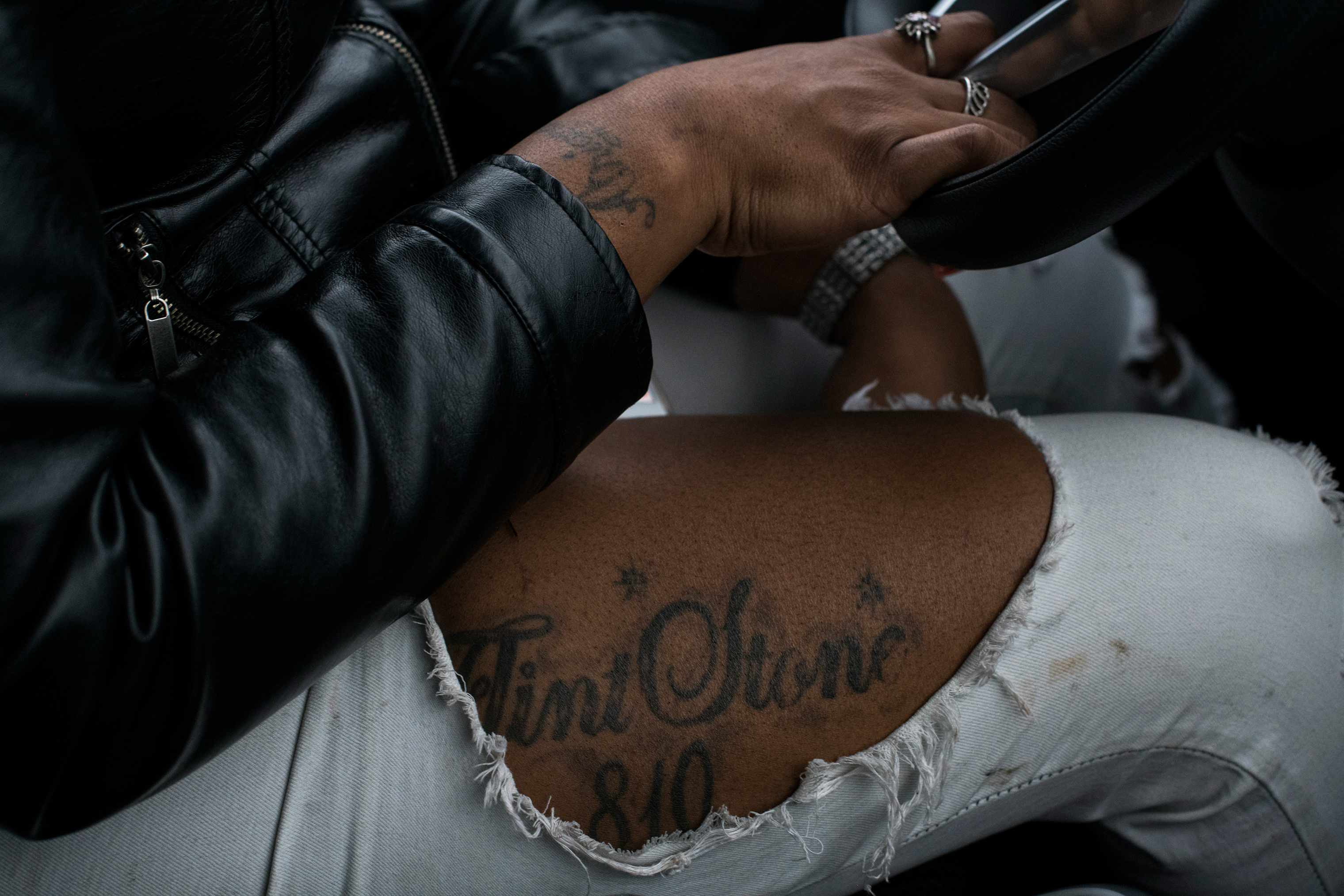 Hawk's "Flint Stone" tattoo, a name many devout natives call themselves, is seen as she drives in February. (Brittany Greeson for TIME)