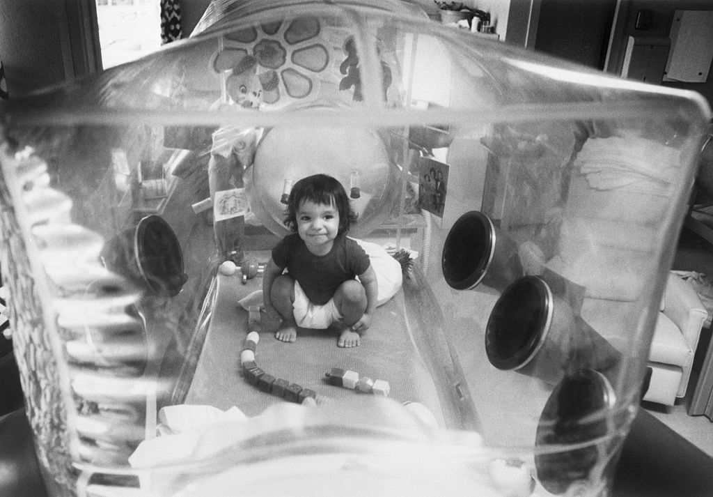 David Vetter, born with immune deficiency syndrome, in his enclosed plastic environment in 1973. (Bettmann&mdash;Bettmann Archive&mdash;Getty Images)
