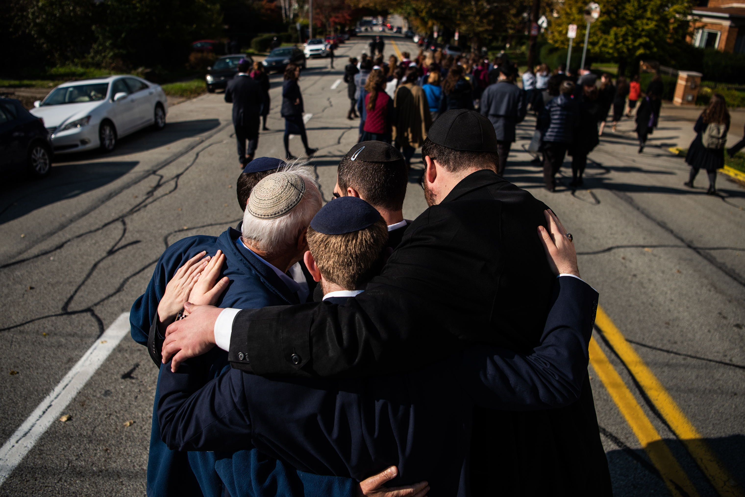Mourners embrace at the funeral of Joyce Fienberg who was killed at the mass shooting at the Tree of Life Synagogue on Oct. 31, 2018, in Pittsburgh, PA. (Salwan Georges—The Washington Post/Getty Images)