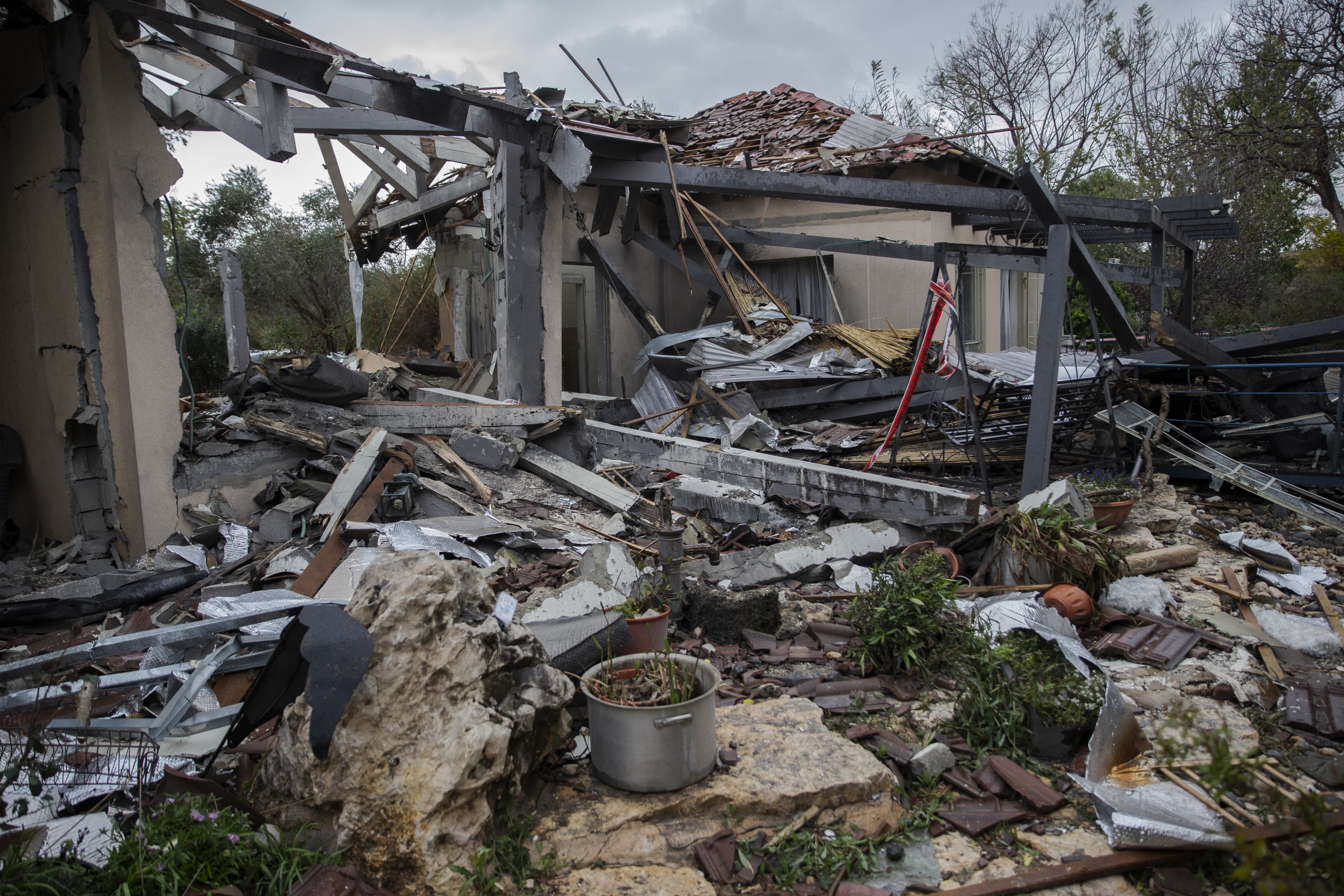 Damaged houses are seen after a rocket hit the village of Mishmeret on March 25, 2019. Seven Israelis were reportedly injured in rocket fire from the Gaza Strip. (Faiz Abu Rmeleh—Anadolu Agency/Getty Images)