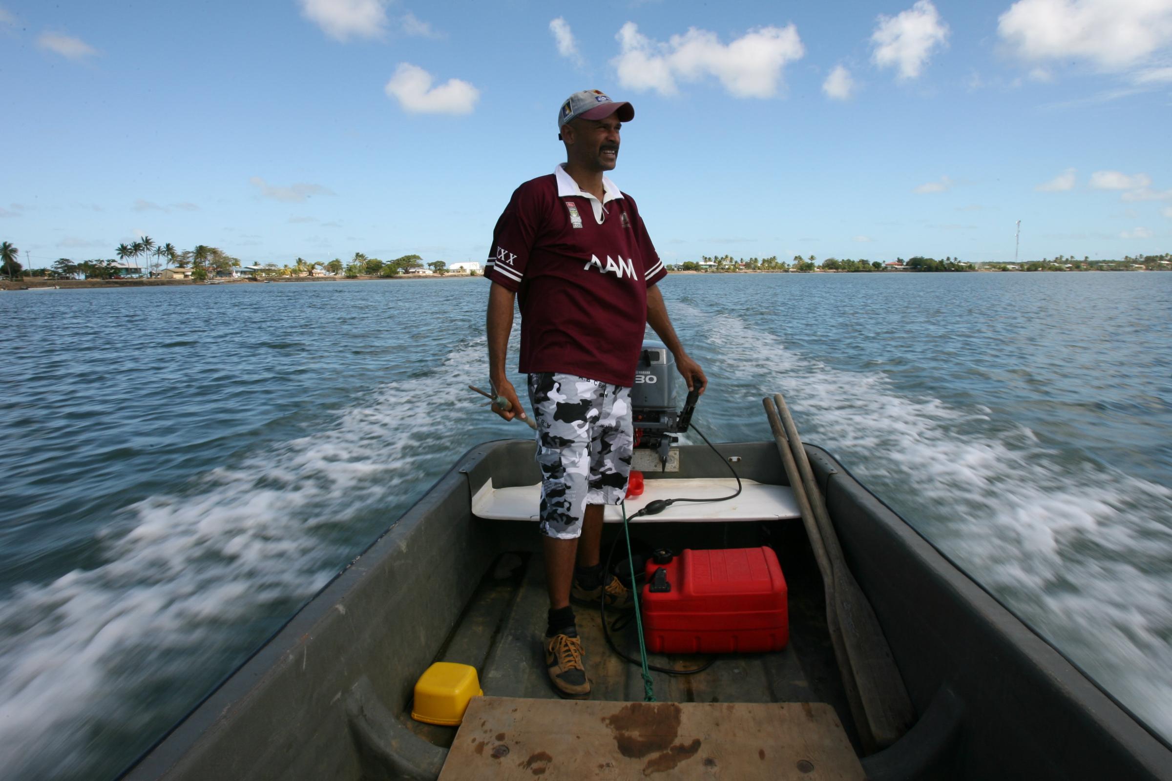 Jensen Warusam, from Saibai Island, on his boat in the Torres Strait