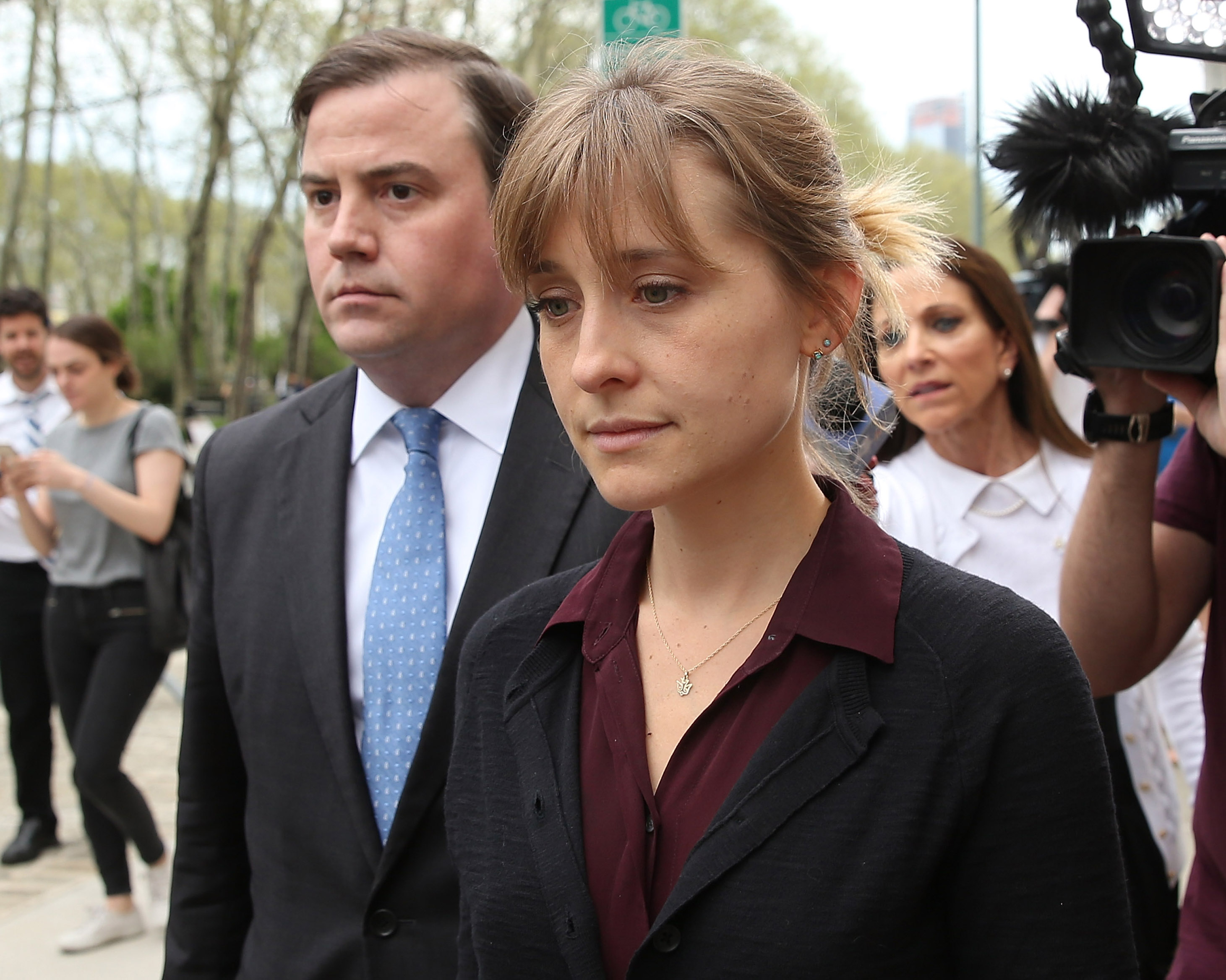 Allison Mack, right, departs the United States Eastern District Court in 2019. (Jemal Countess—Getty Images)