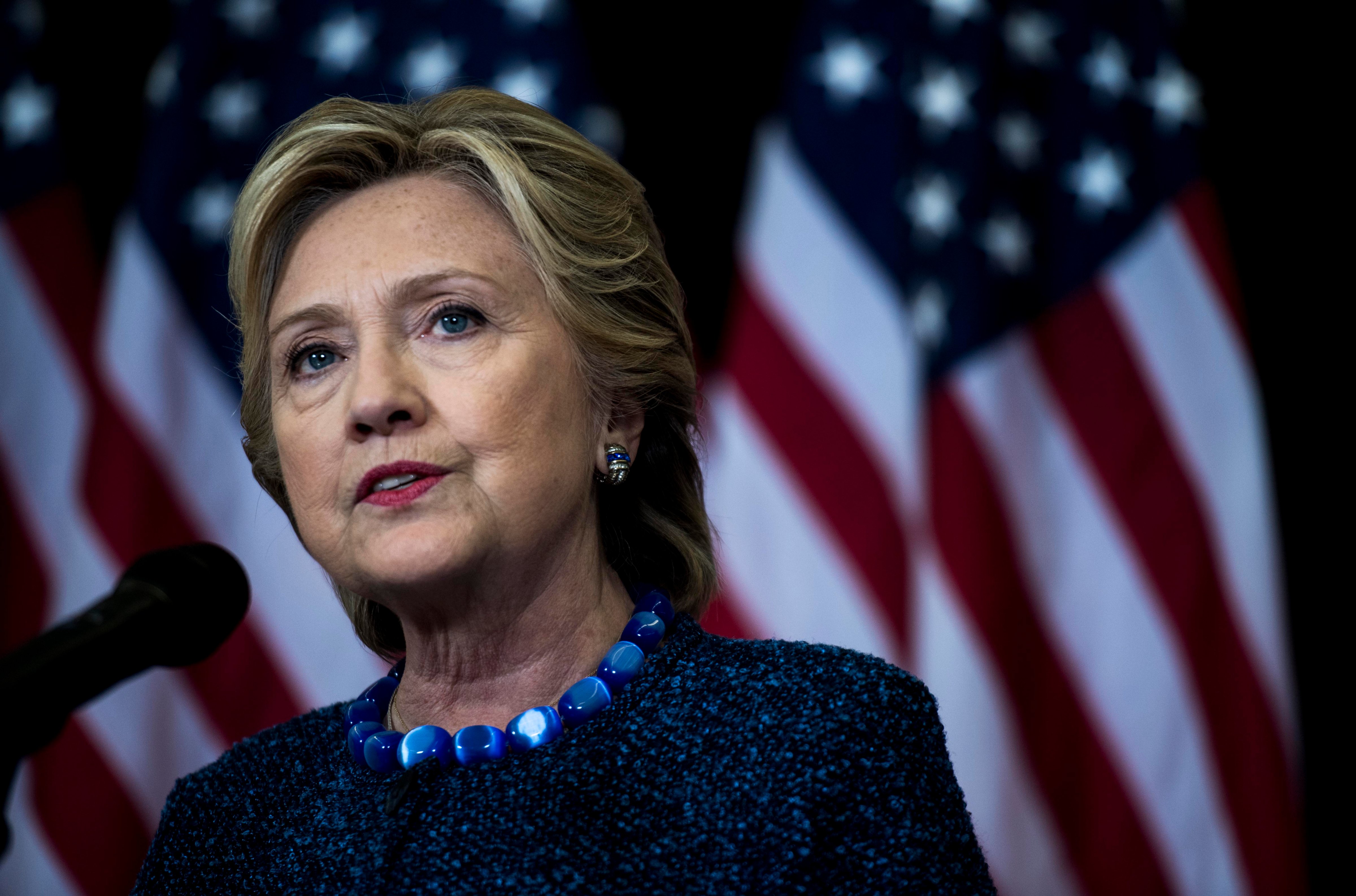 Former Democratic candidate for President of the United States Hillary Clinton speaks to journalists to comment on the FBI investigation concerning Clinton's private emails, Oct. 28, 2016. (Melina Mara—The Washington Post/Getty Images)