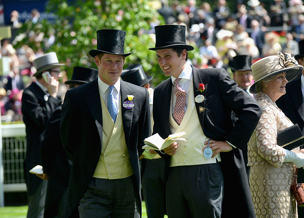 Prince Harry and Jake Warren attend day one of Royal Ascot at Ascot Racecourse on June 17, 2014 in Ascot, England. (Kirstin Sinclair—2014 Getty Images)