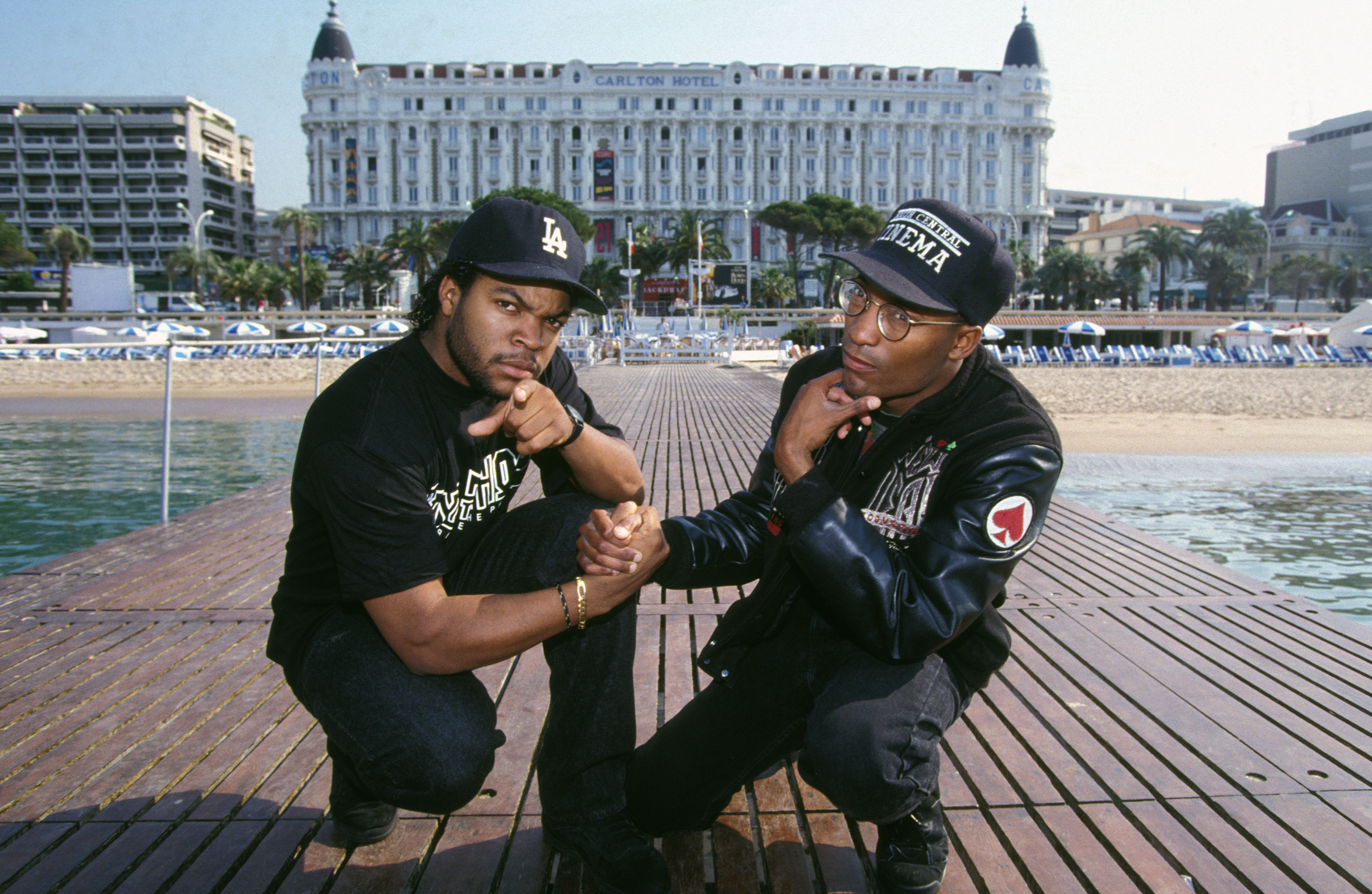 Actor and rapper Ice Cube with John Singleton, director of 'Boyz N the Hood' at Cannes in May 1991 in France. (Pool ARNAL/GARCIA/PICOT/Gamma-Rapho via Getty Images)