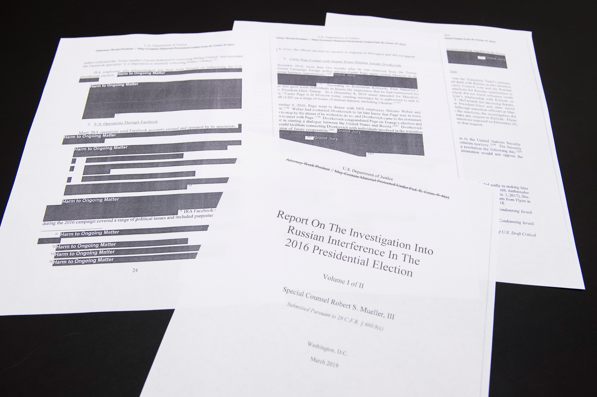 A few pages of Special Counsel Robert Mueller's report on Russian interference in the 2016 election that were printed out by staff in the House Judiciary Committee's hearing room on April 18, 2019. (Tom Williams—CQ Roll Call/Getty Images)