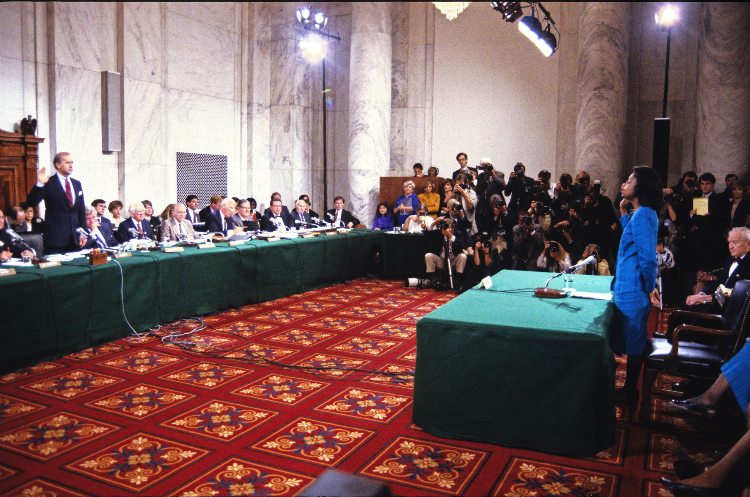 A presidential campaign would spotlight Biden’s record on gender issues, from the Anita Hill hearings in 1991 (pictured) to his introduction of the 1994 Violence Against Women Act, to his tactile tendencies, as in a 2012 campaign stop at a Seaman, Ohio, diner (Arnie Sachs—Picture-Alliance/DPA/AP)