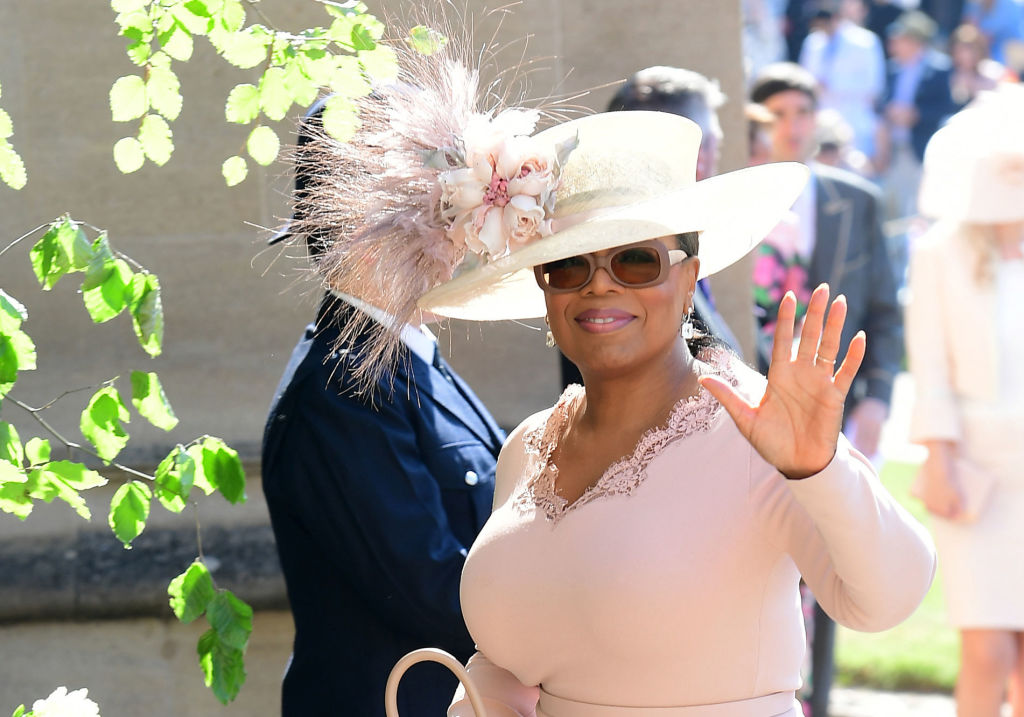 US presenter Oprah Winfrey arrives for the wedding ceremony of Britain's Prince Harry, Duke of Sussex and US actress Meghan Markle at St George's Chapel, Windsor Castle, in Windsor, on May 19, 2018. (Ian West—AFP/Getty Images)