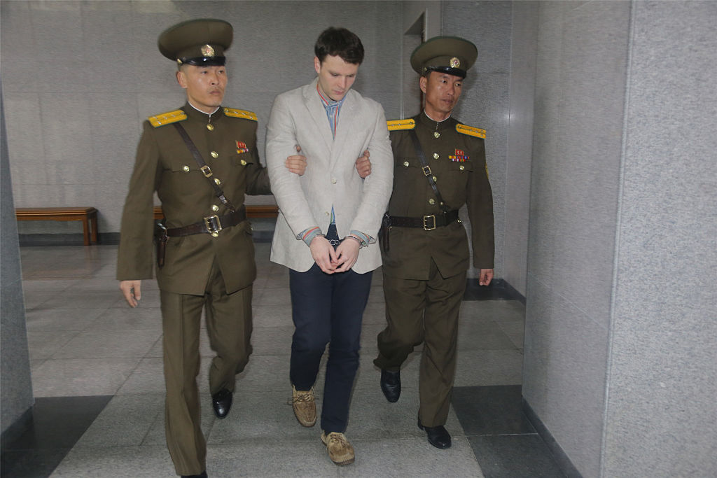 Otto Frederick Warmbier arrives at a court for his trial in Pyongyang, North Korea, on March 16, 2015. (Lu Rui—Xinhua News Agency/Getty Images)